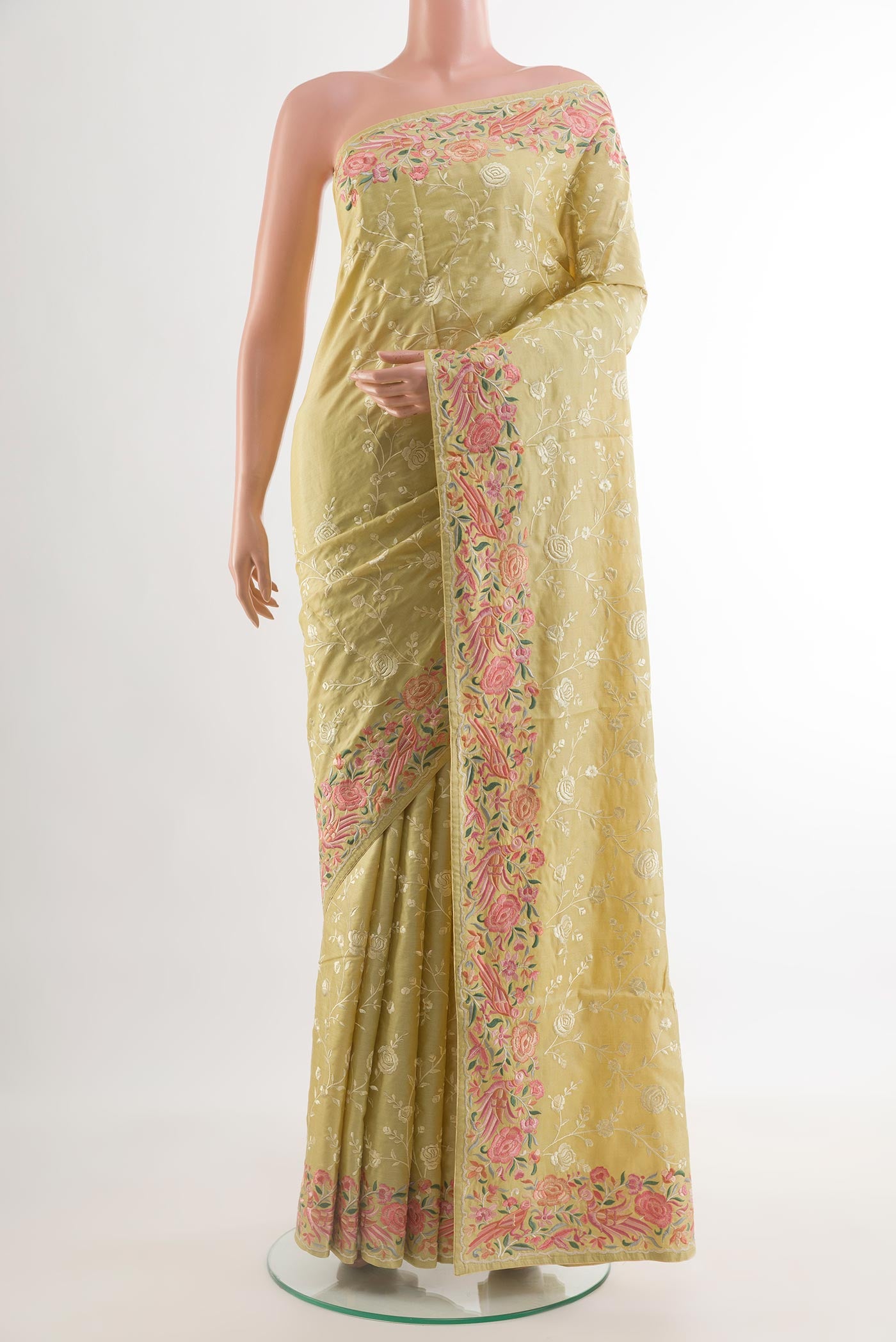 Lemon Yellow Tussar Silk Saree with Embroidery on the body and Embroidery Border.  displayed on a mannequin