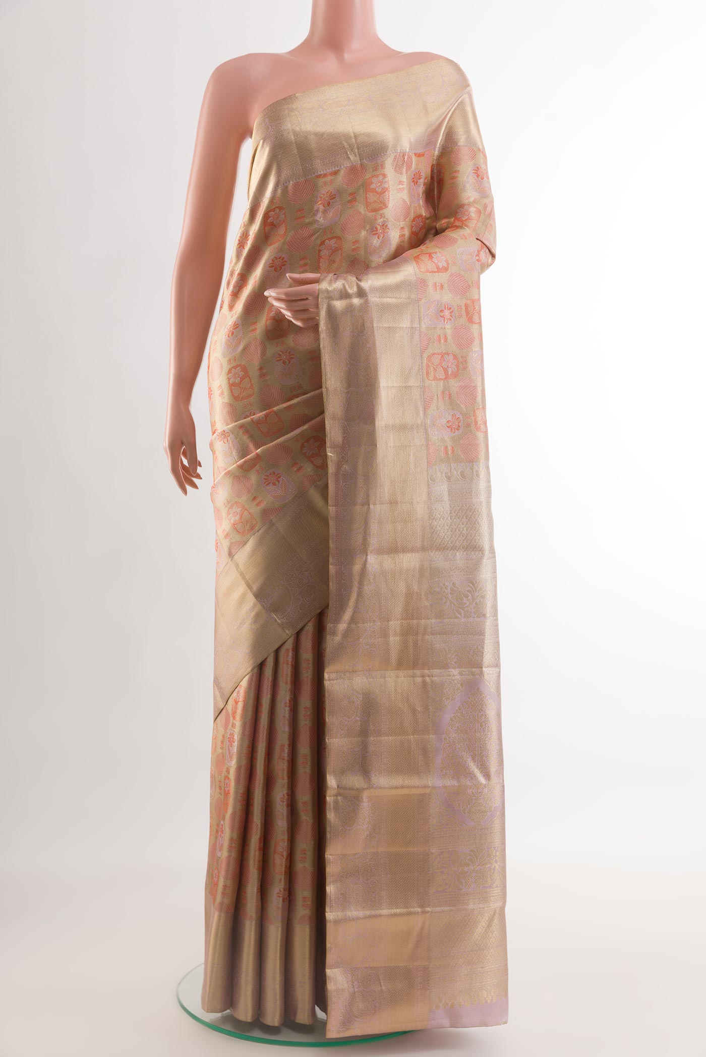 Golden Dual Tone Kanjivaram Tissue Silk Saree with Zari Brocade on the body and Zari Border.  displayed on a mannequin