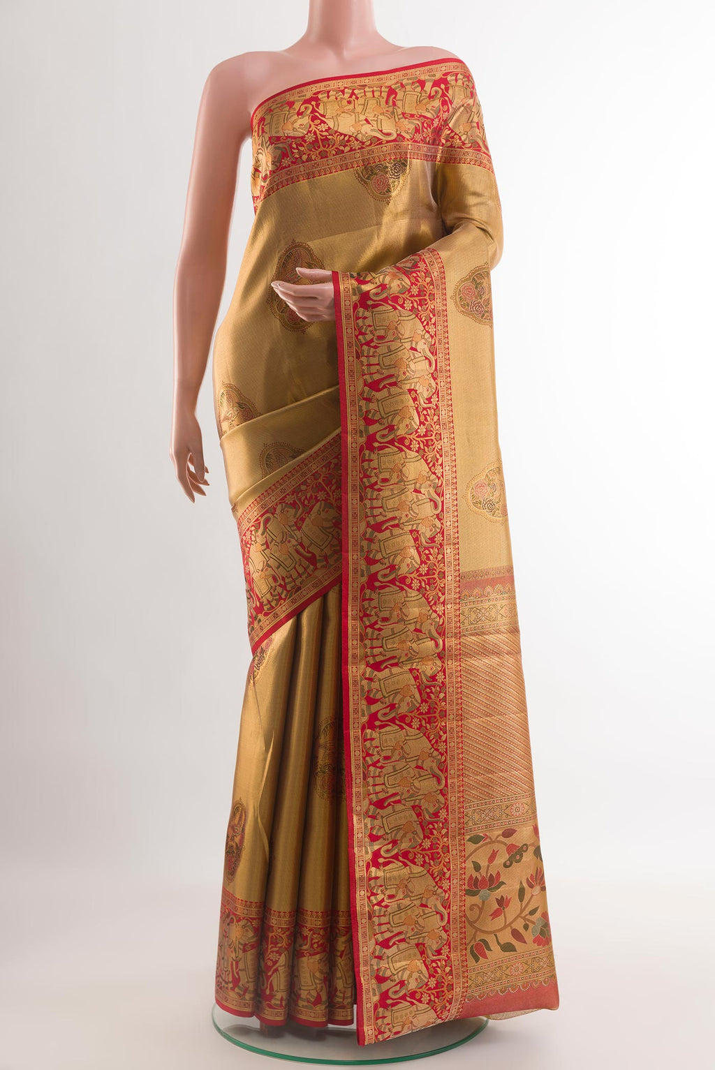 Golden Kanchipuram Tissue Silk Saree with Zari Brocade on the body and Zari Border.  displayed on a mannequin