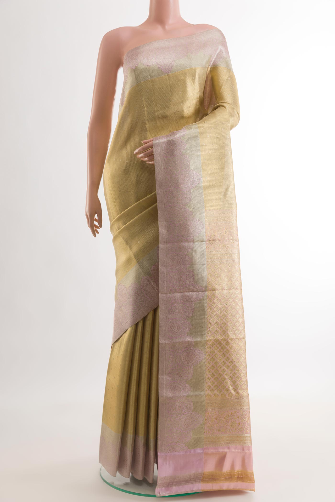 Golden Kanjivaram Tissue Silk Saree with Zari Brocade on the body and Zari Border.  displayed on a mannequin