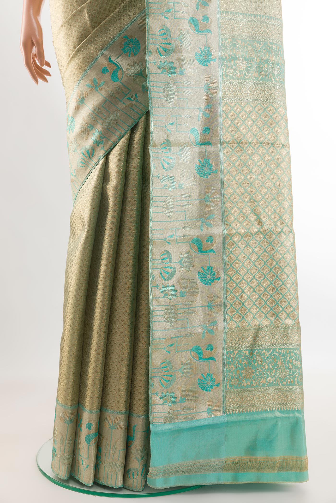 Pleats and pallu of Golden Kanjivaram Tissue Silk Saree with Zari Brocade on the body and Zari Border. 