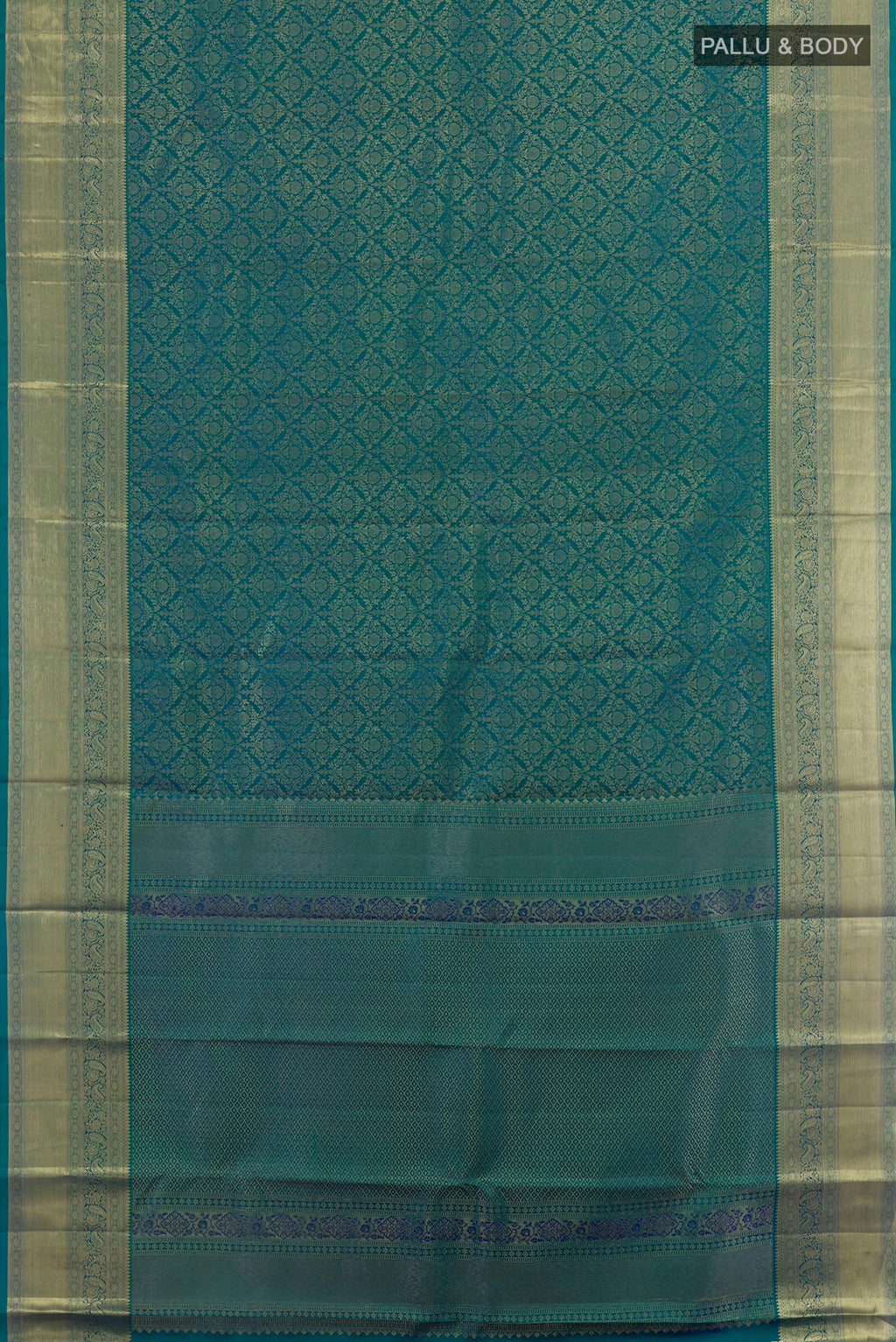 Flat view of Peacock Blue Dual Tone Kanchipuram Silk Saree with Zari Brocade on the body and Zari Border. 