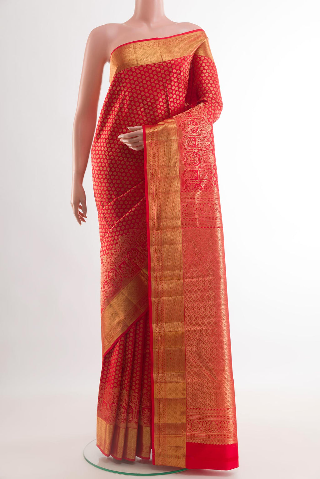 Red Kanchipuram Silk Saree with Zari Brocade on the body and Zari Border.  displayed on a mannequin