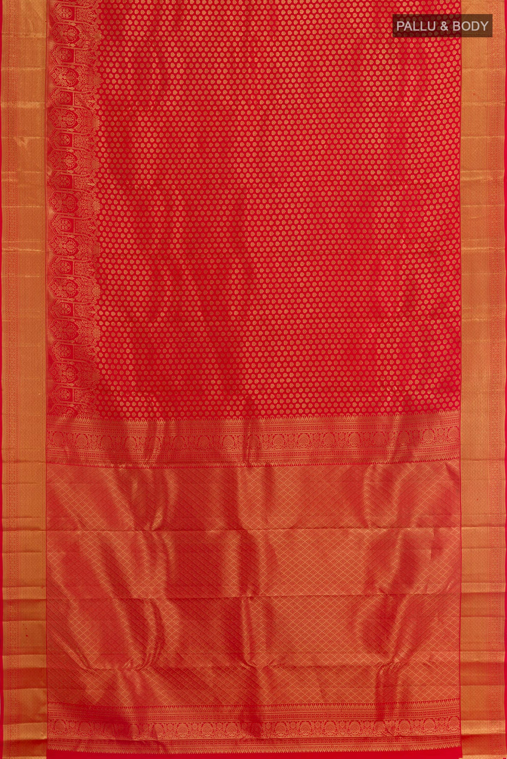 Flat view of Red Kanchipuram Silk Saree with Zari Brocade on the body and Zari Border. 