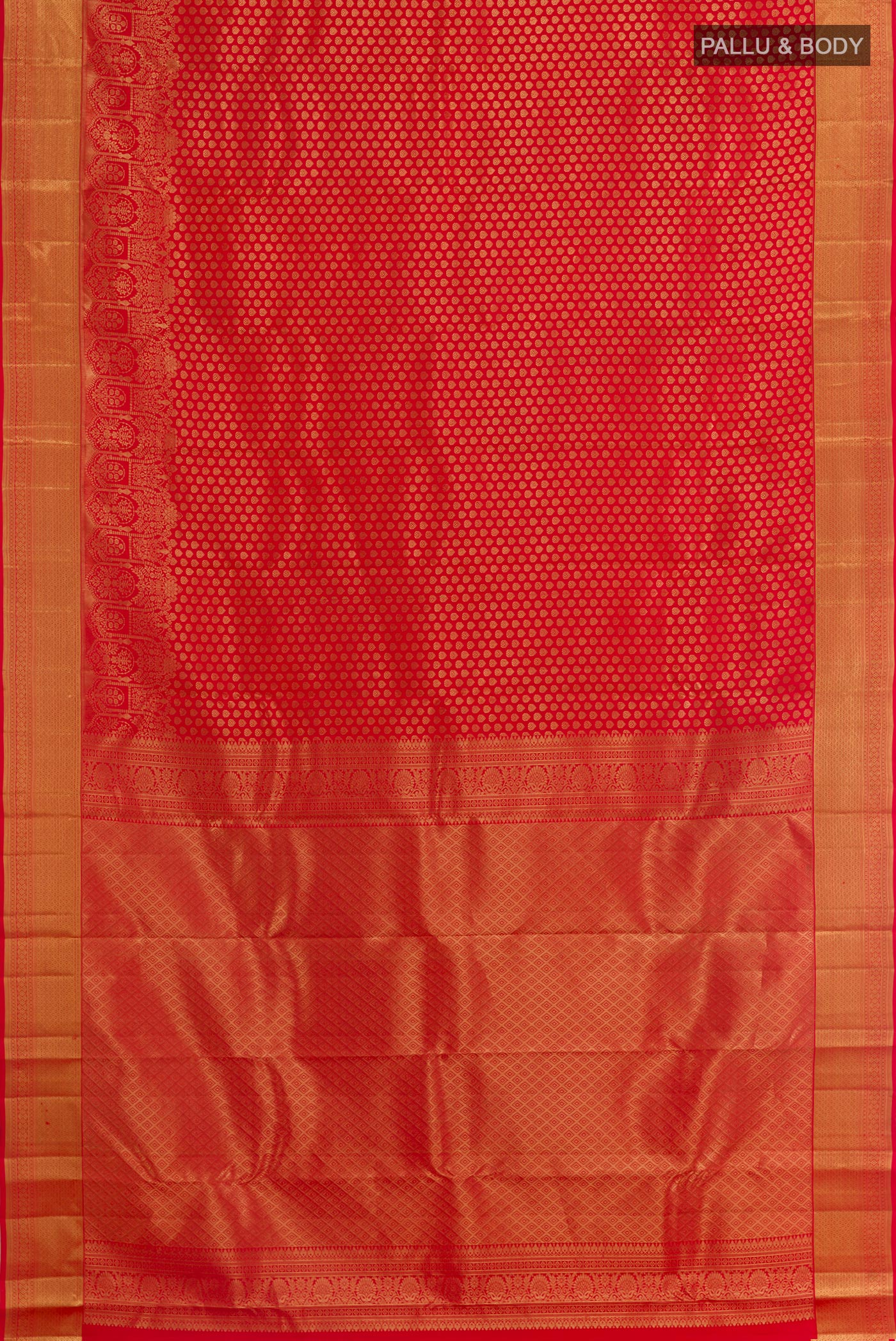 Flat view of Red Kanchipuram Silk Saree with Zari Brocade on the body and Zari Border. 