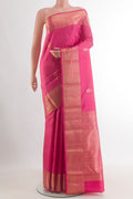 Pure Silk Pink Kanchipuram Saree with Zari Butta on the body and Zari Border.  displayed on a mannequin