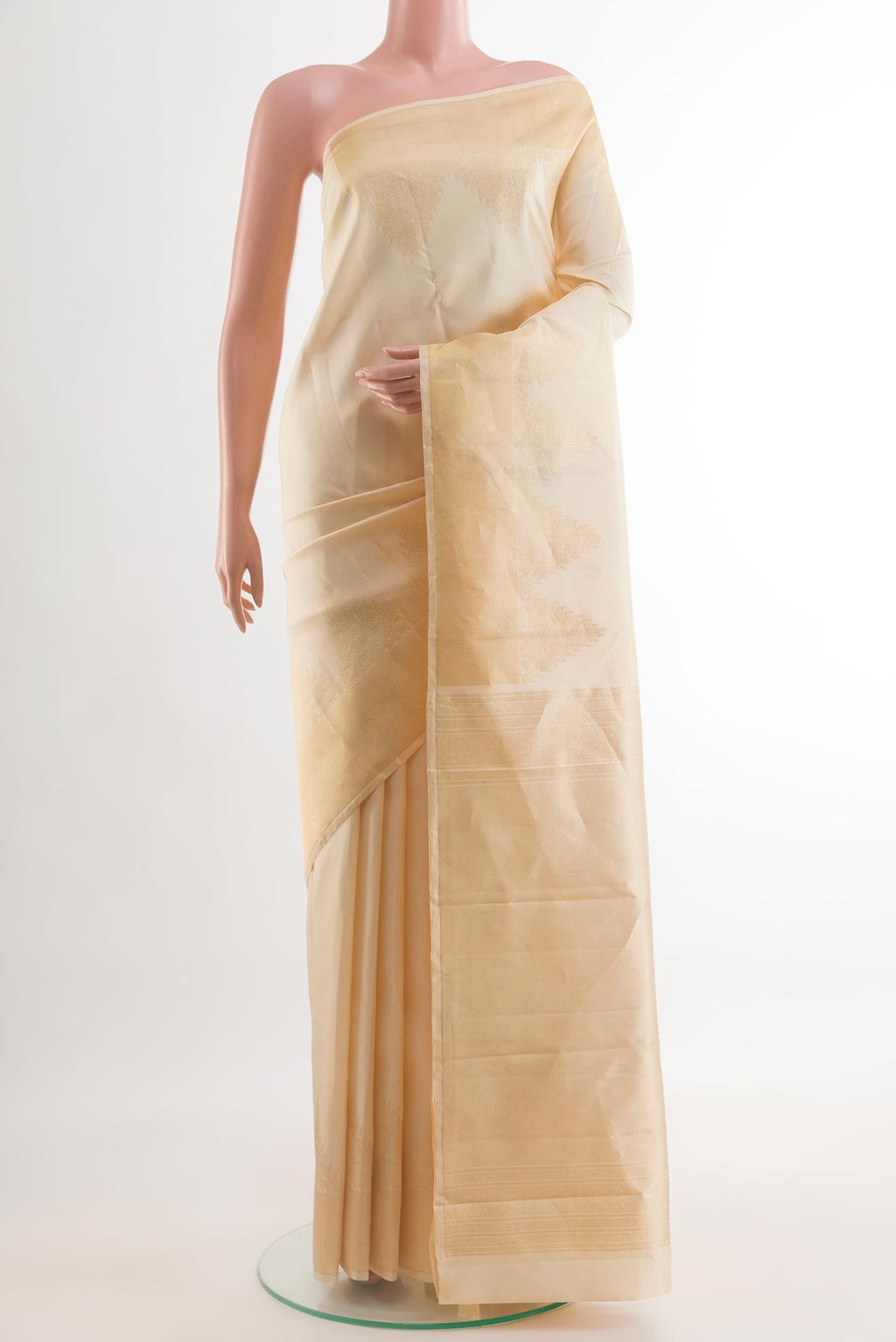 Cream Kanchipuram Silk Saree with Plain Body and Temple Border.  displayed on a mannequin