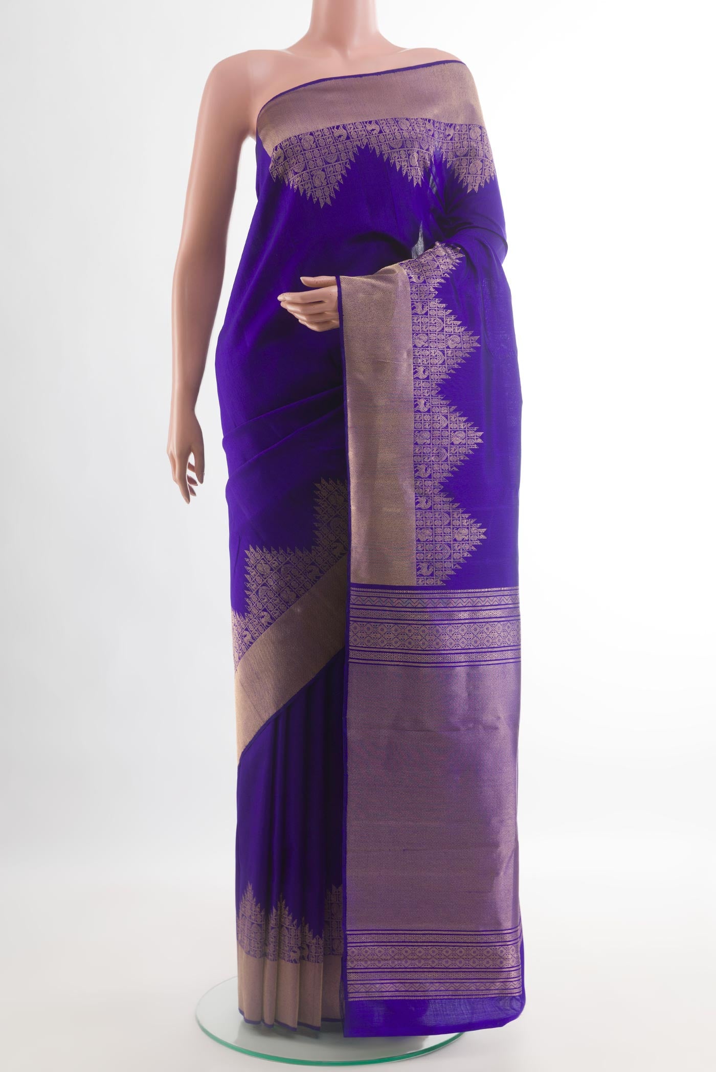 Blue Kanchipuram Silk Saree with Plain Body and Zari Border.  displayed on a mannequin