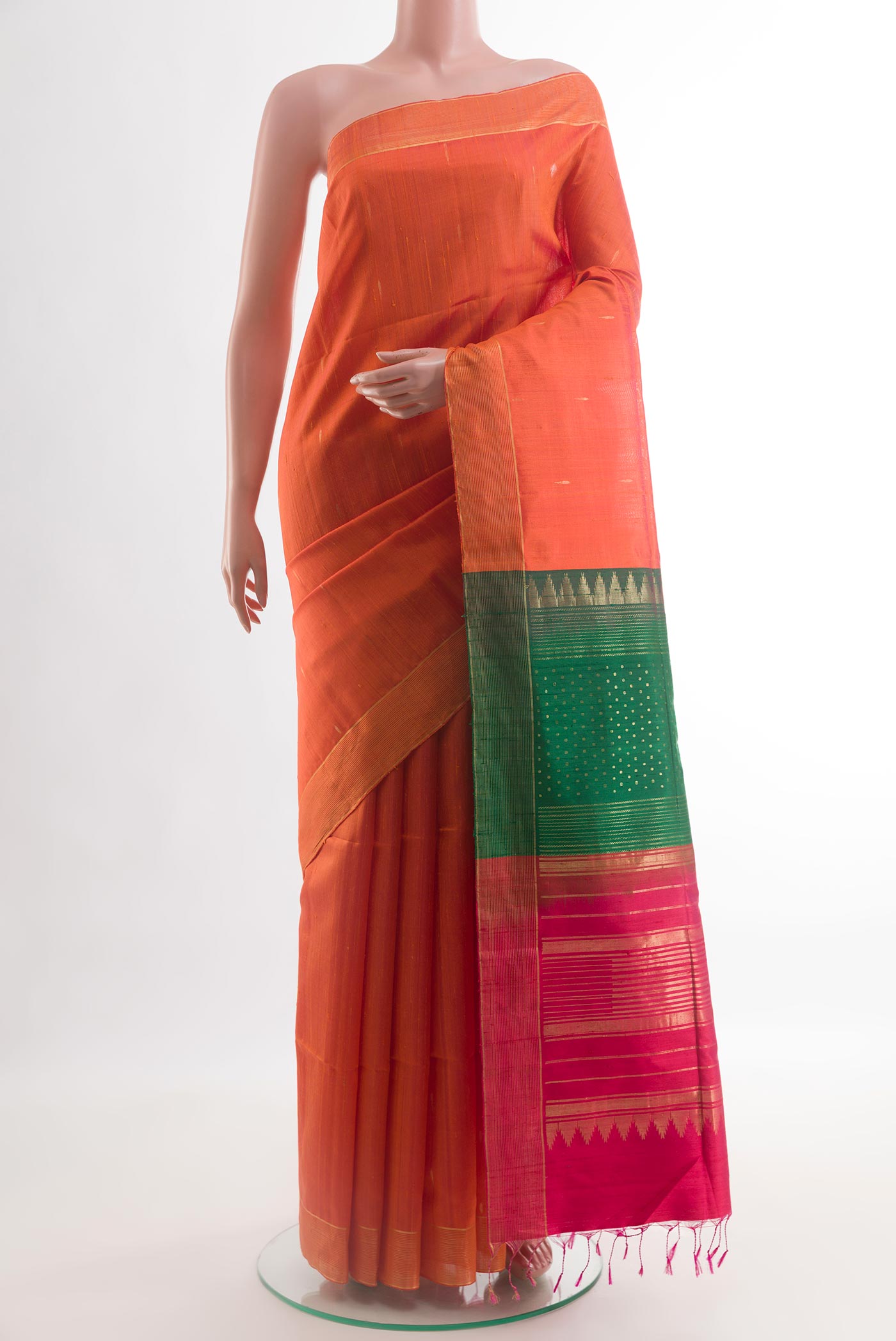Orange Raw Silk Saree with Stripes on the body and Zari Border.  displayed on a mannequin
