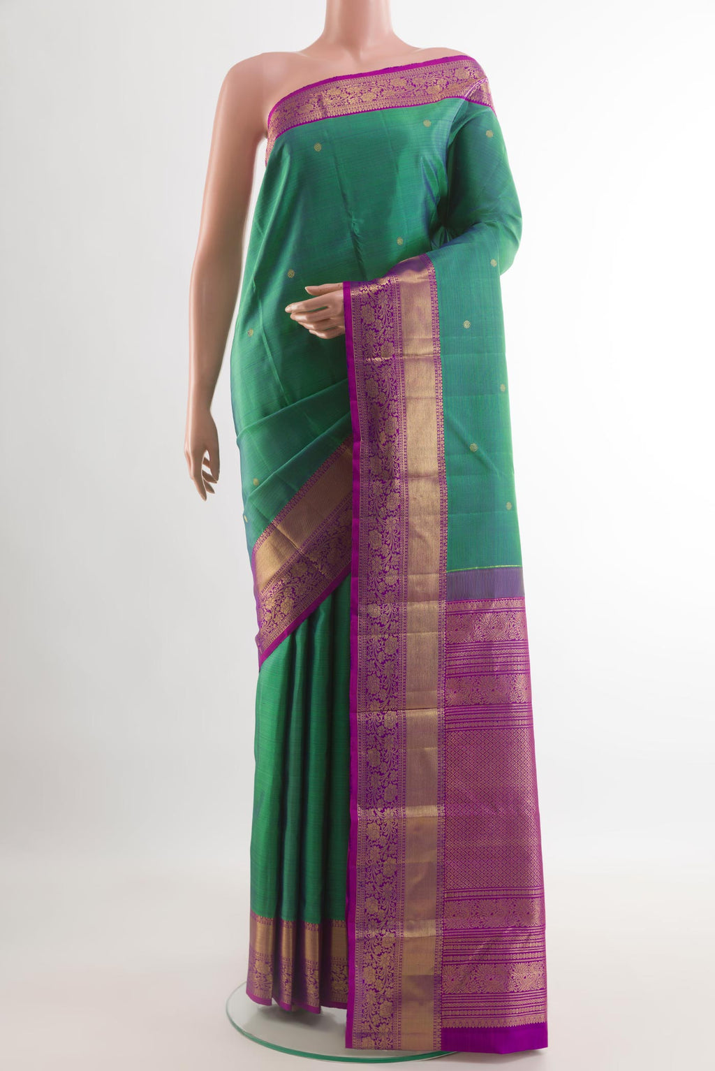 Sea Green Dual Tone Kanchipuram Silk Saree with Zari Butta on the body and Zari Border.  displayed on a mannequin