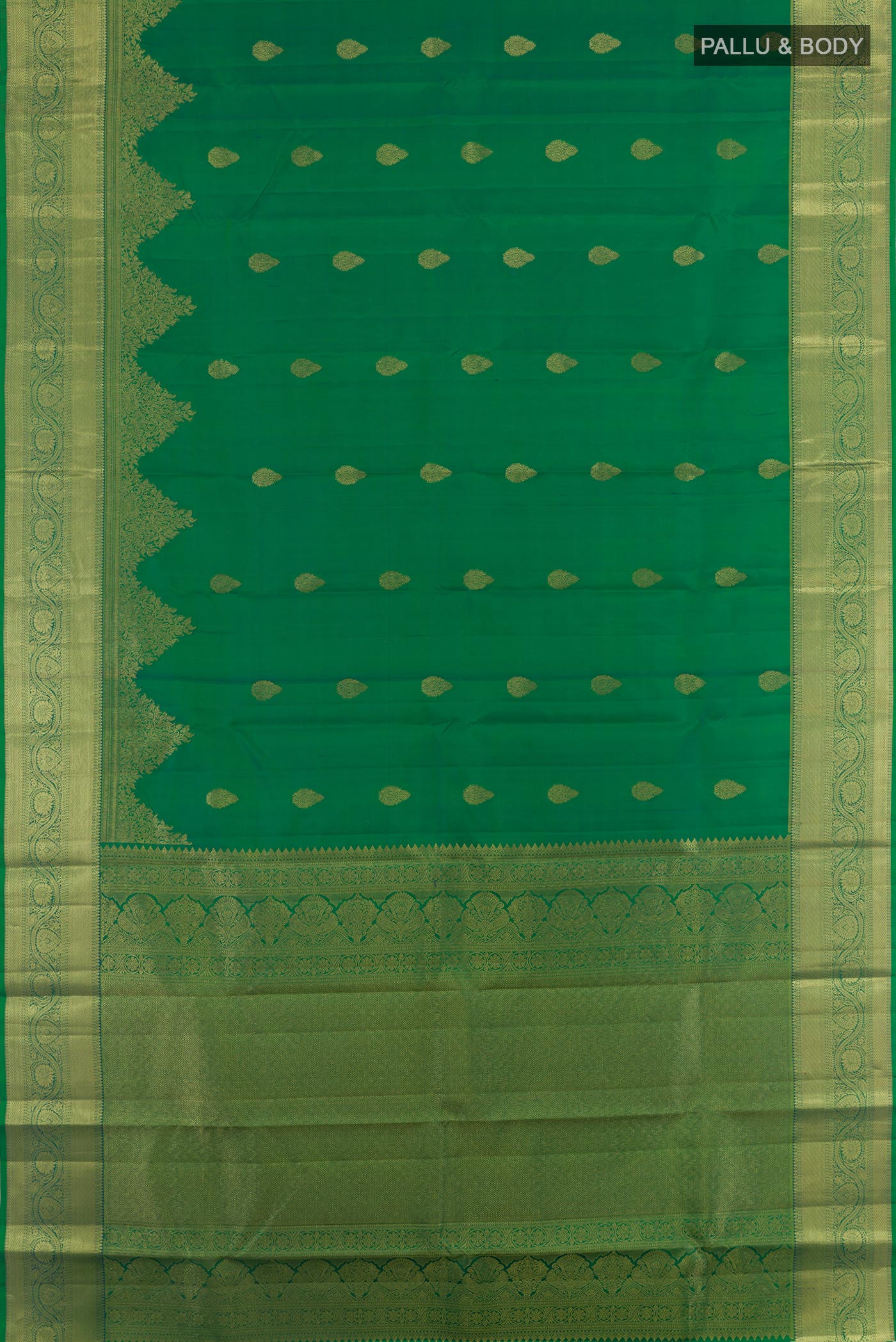 Flat view of Green Kanchipuram Silk Saree with Zari Butta on the body and Zari Border. 