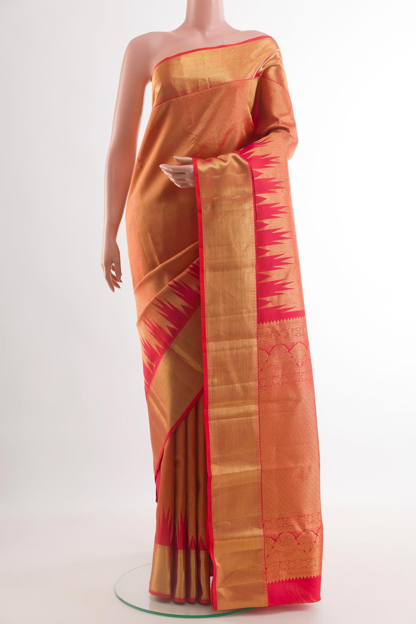 Red Kanchipuram Silk Saree with Zari Brocade on the body and Zari Border.  displayed on a mannequin