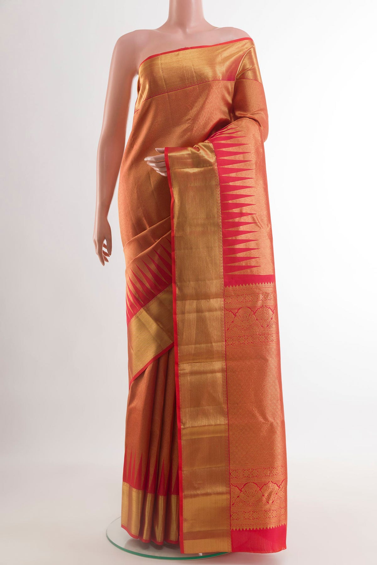 Red Kanchipuram Silk Saree with Zari Brocade on the body and Zari Border.  displayed on a mannequin