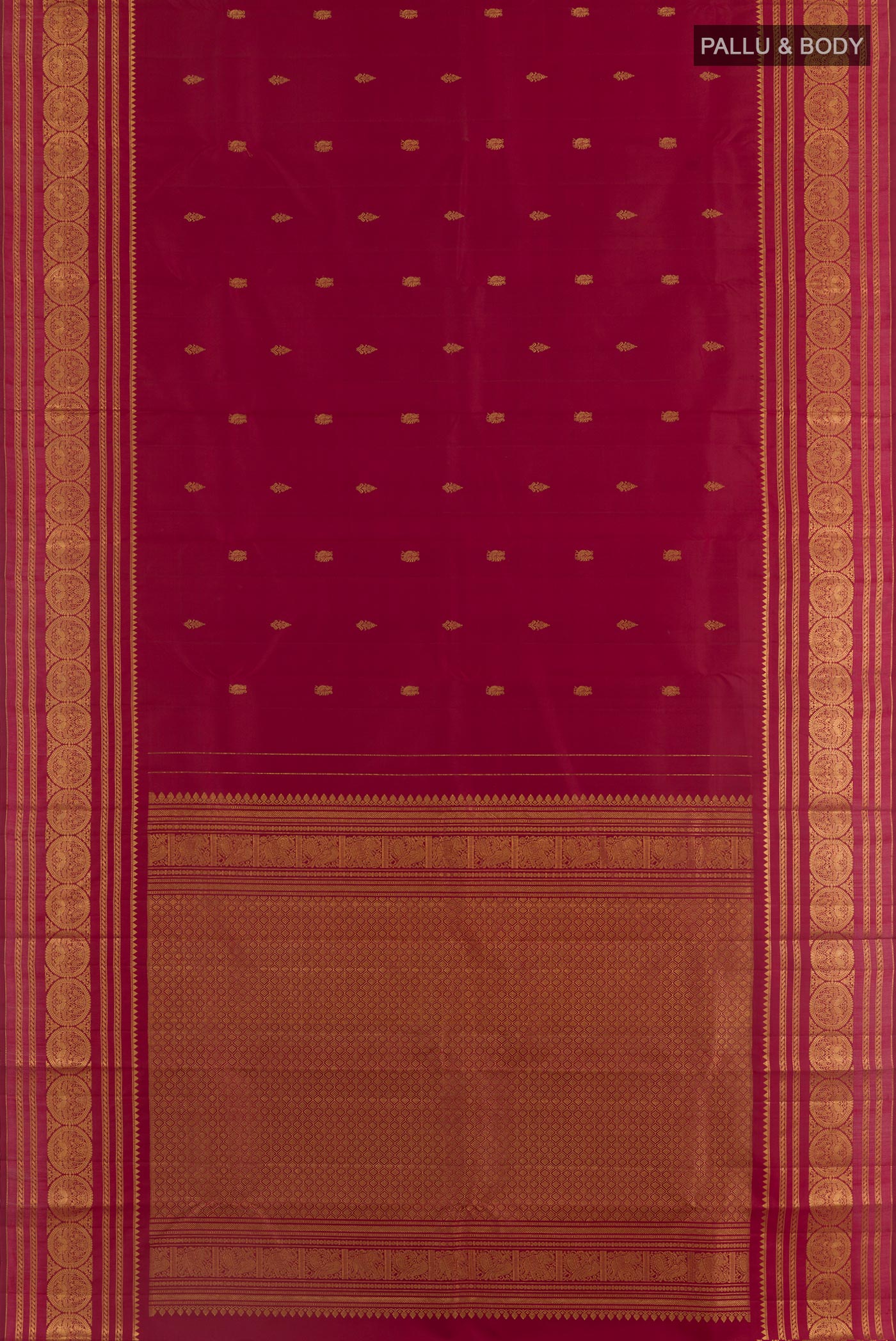 Flat view of Maroon Kanjivaram Silk Saree with Zari Butta on the body and Zari Border. 