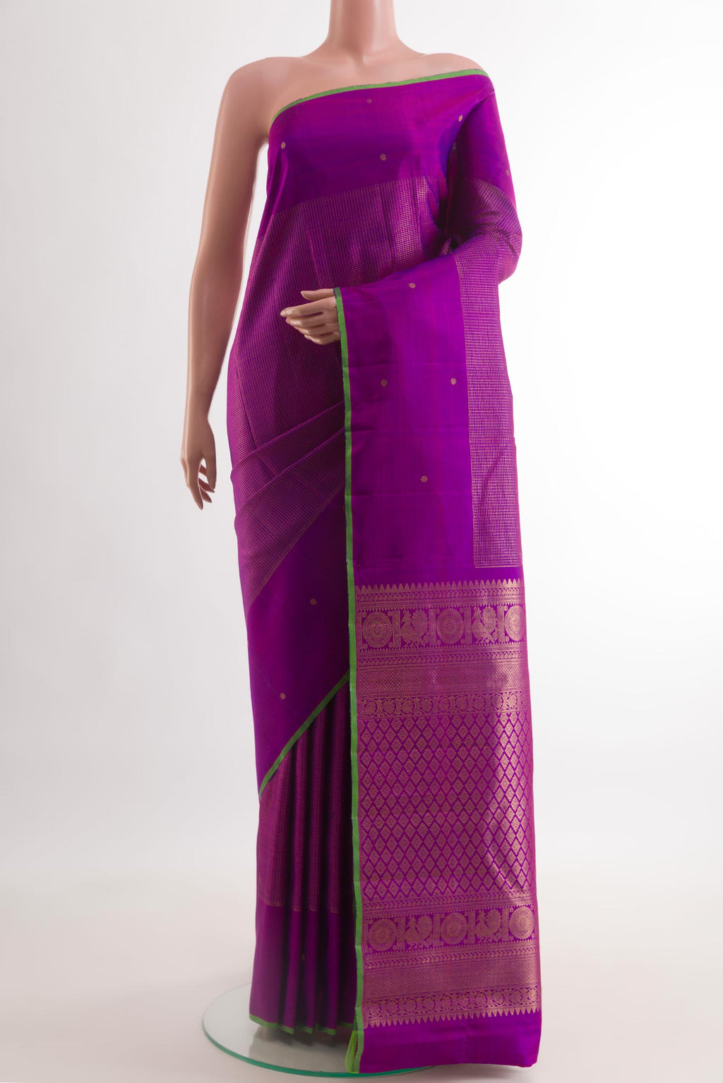 Purple Kanjivaram Silk Saree with Zari Brocade on the body and Zari Border.  displayed on a mannequin