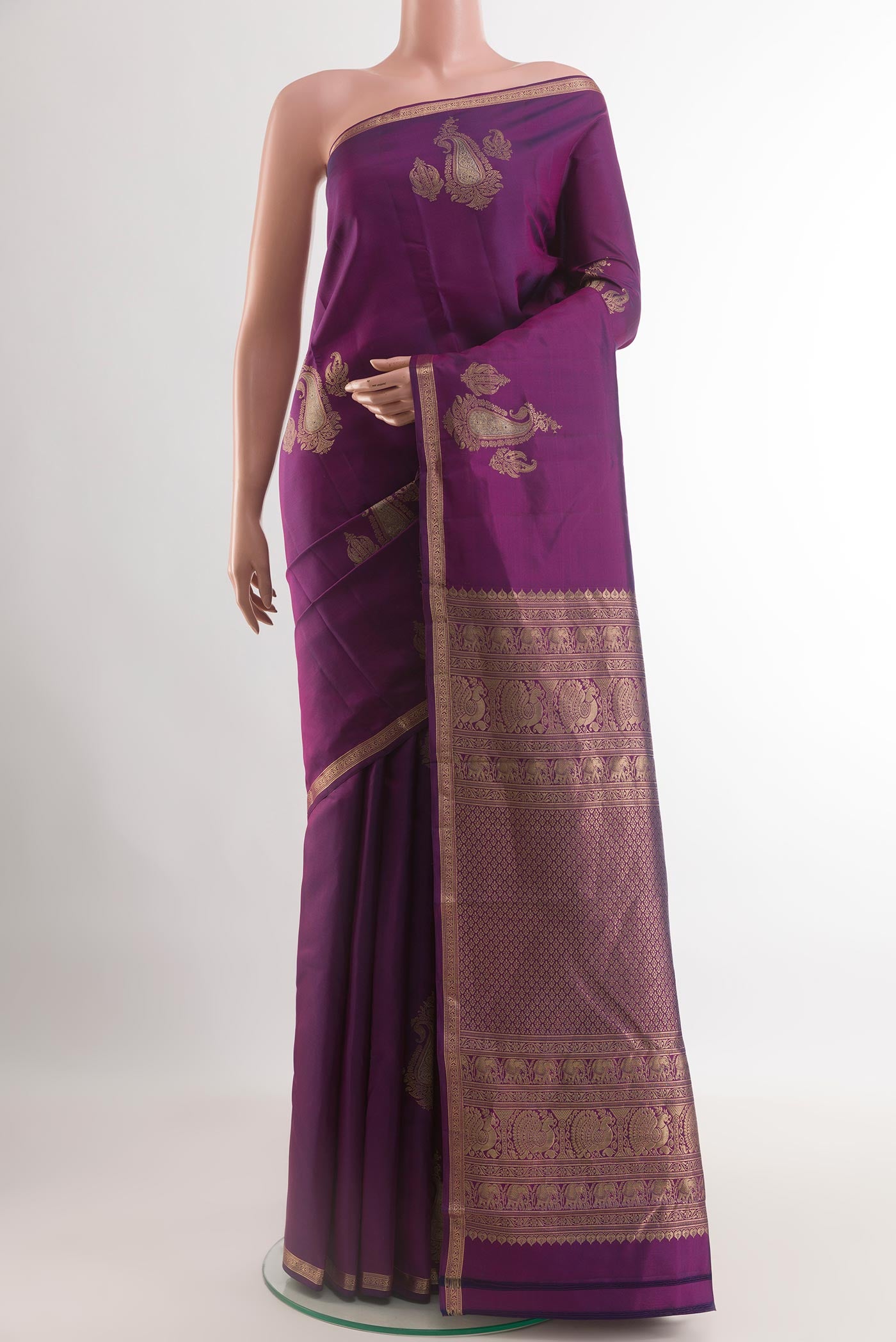 Purple Kanchipuram Silk Nine Yards Saree with Zari Butta on the body and Zari Border.  displayed on a mannequin