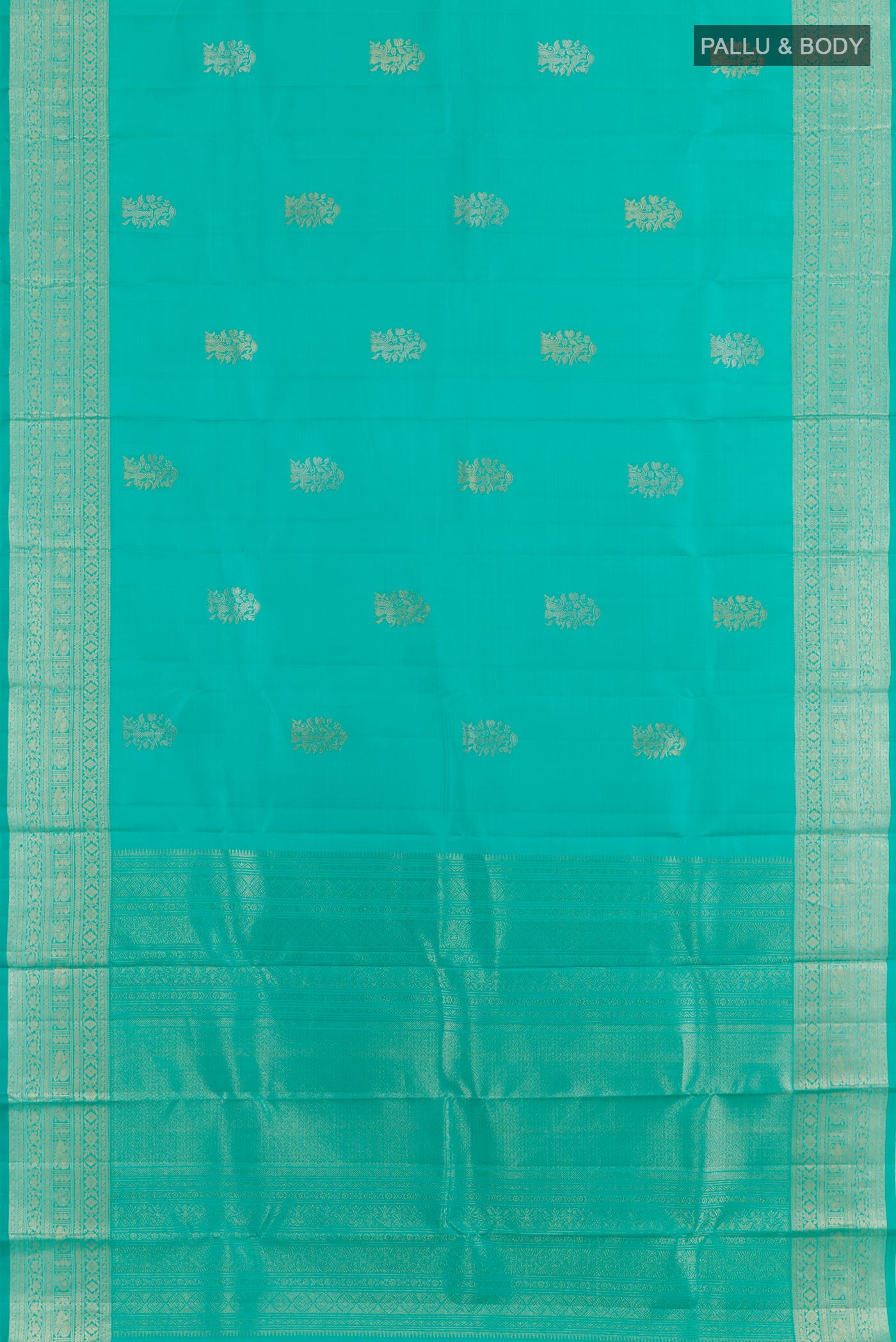 Flat view of Blue Kanchipuram Silk Saree with Zari Butta on the body and Zari Border. 