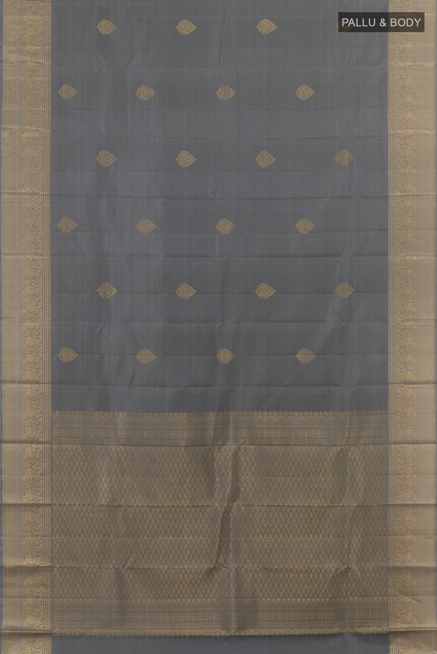Flat view of Grey Kanchipuram Silk Saree with Zari Butta on the body and Zari Border. 