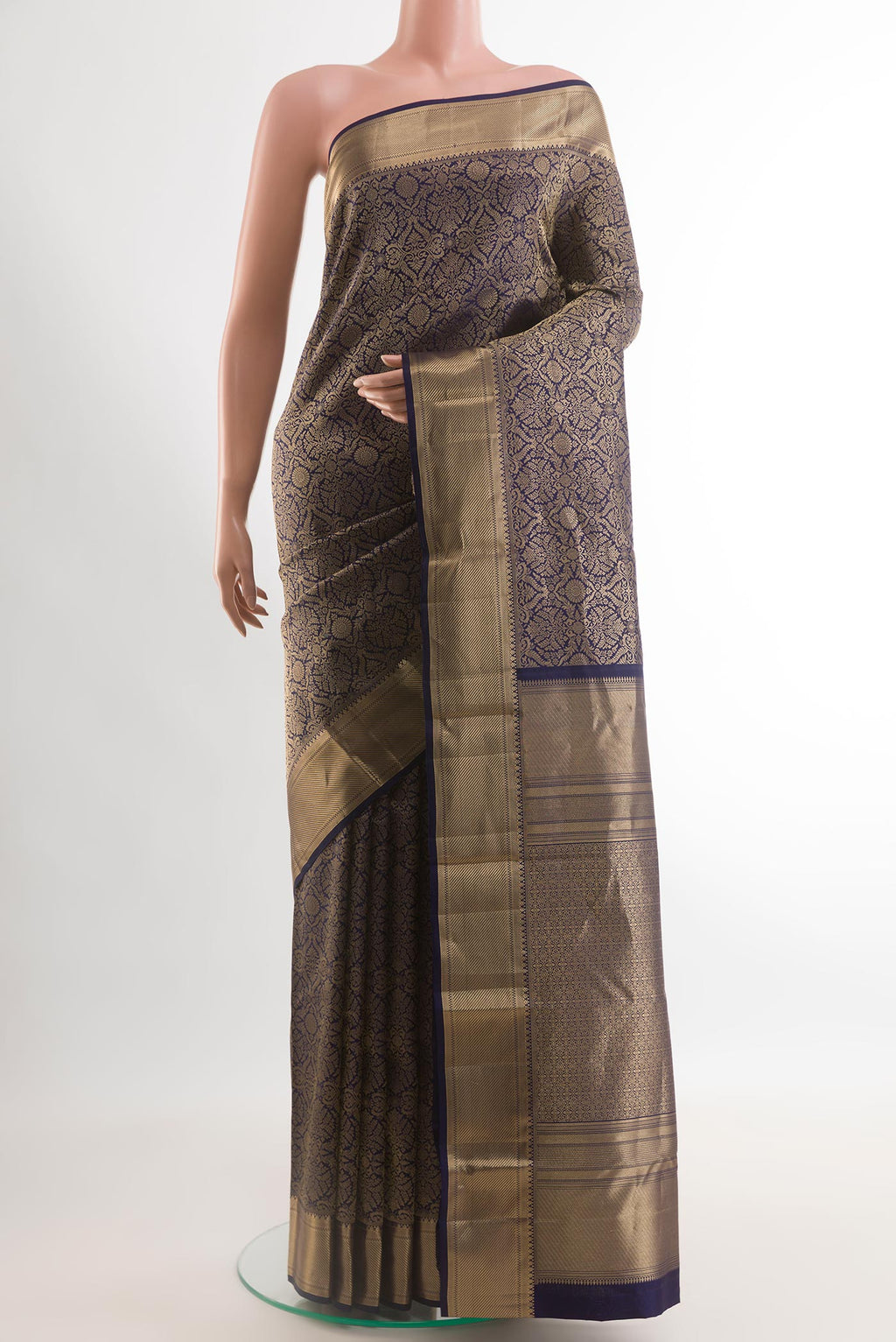 Navy Blue Kanchipuram Silk Saree with Zari Brocade on the body and Zari Border.  displayed on a mannequin
