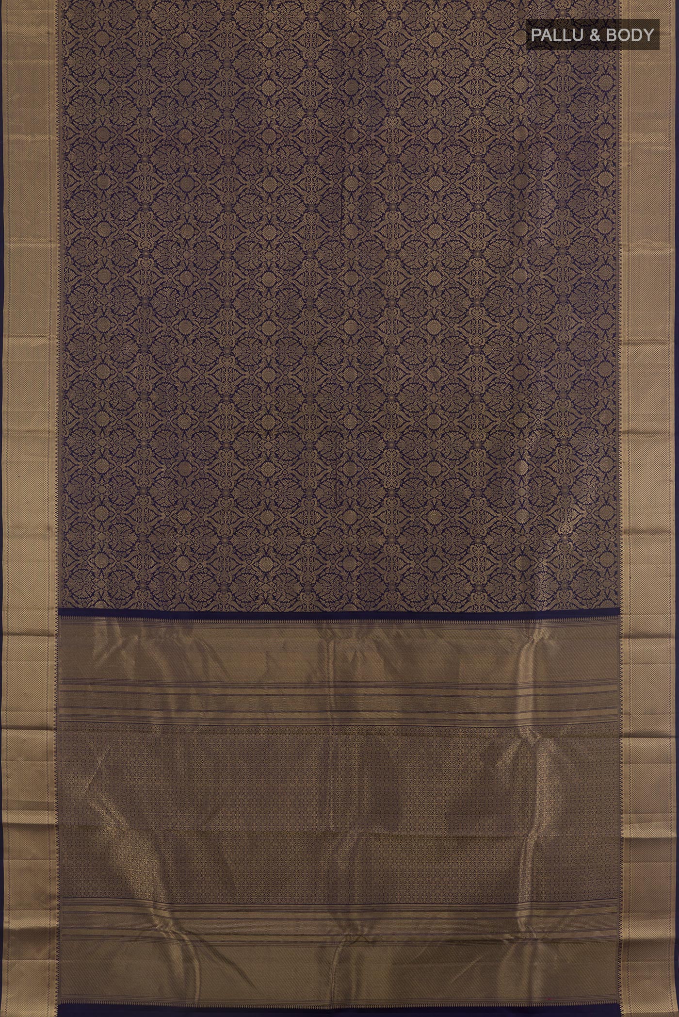 Flat view of Navy Blue Kanchipuram Silk Saree with Zari Brocade on the body and Zari Border. 