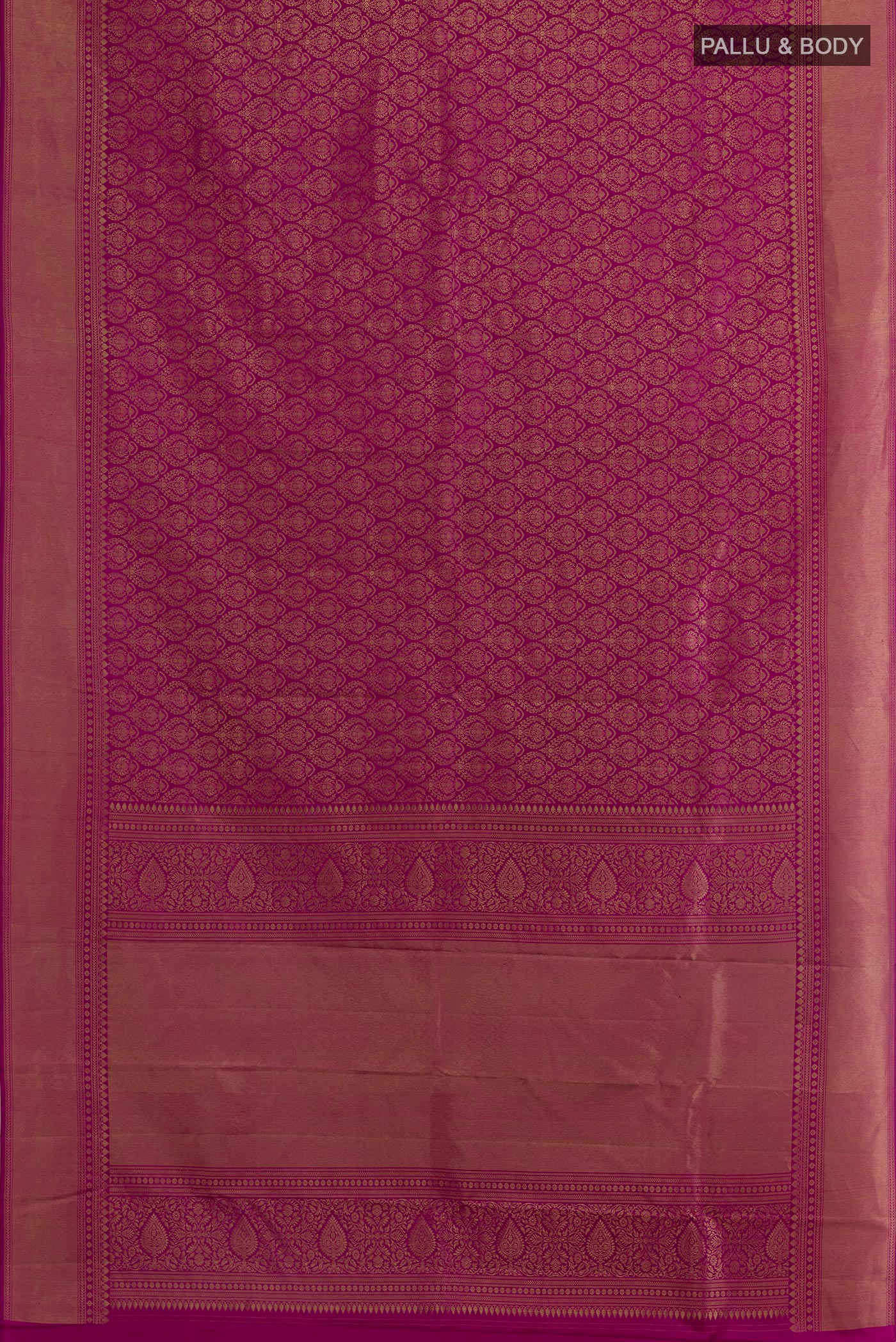 Flat view of Magenta Kanchipuram Silk Saree with Zari Brocade on the body and Zari Border. 