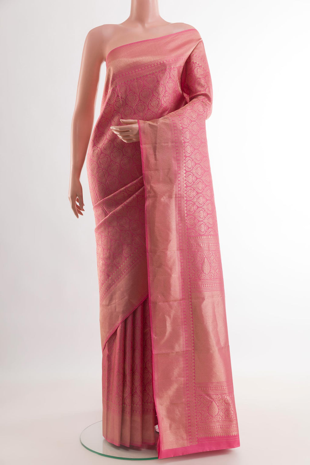 Pink Kanchipuram Silk Saree with Zari Brocade on the body and Zari Border.  displayed on a mannequin