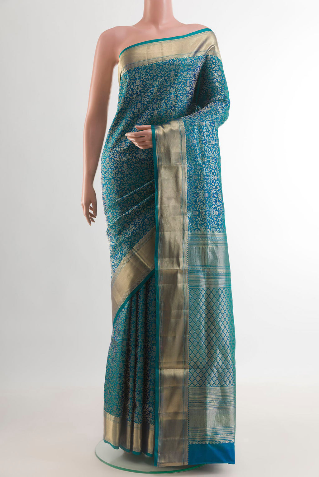 Blue Soft Silk Saree with Zari Brocade on the body and Zari Border.  displayed on a mannequin