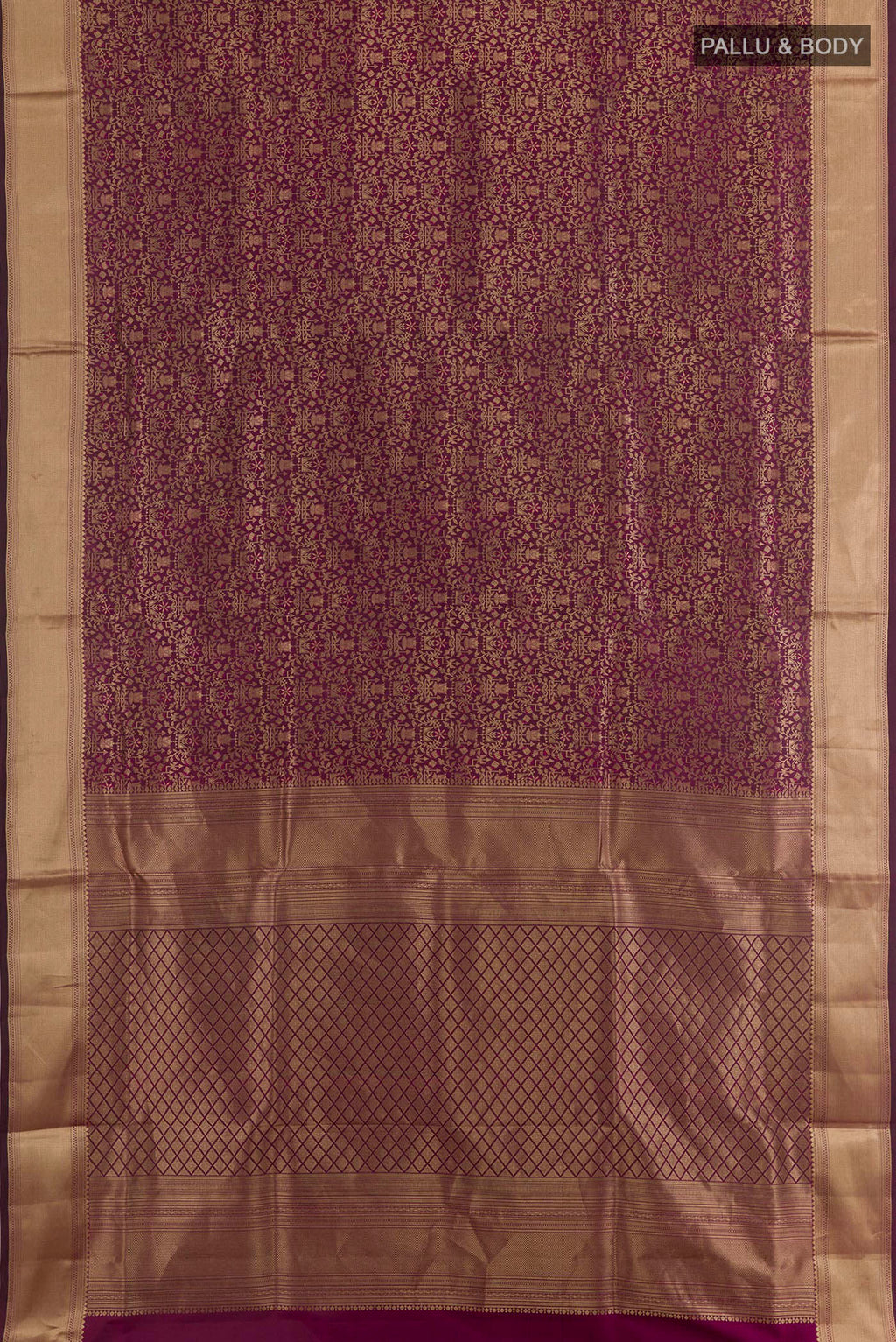 Flat view of Purple Soft Silk Saree with Zari Brocade on the body and Zari Border. 
