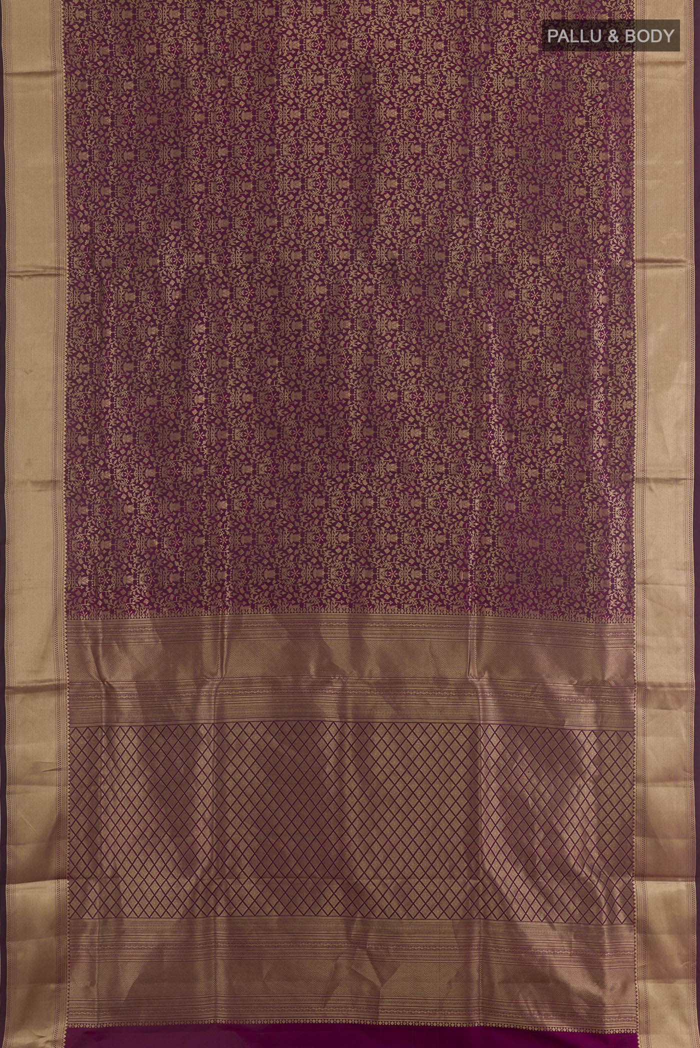 Flat view of Purple Soft Silk Saree with Zari Brocade on the body and Zari Border. 