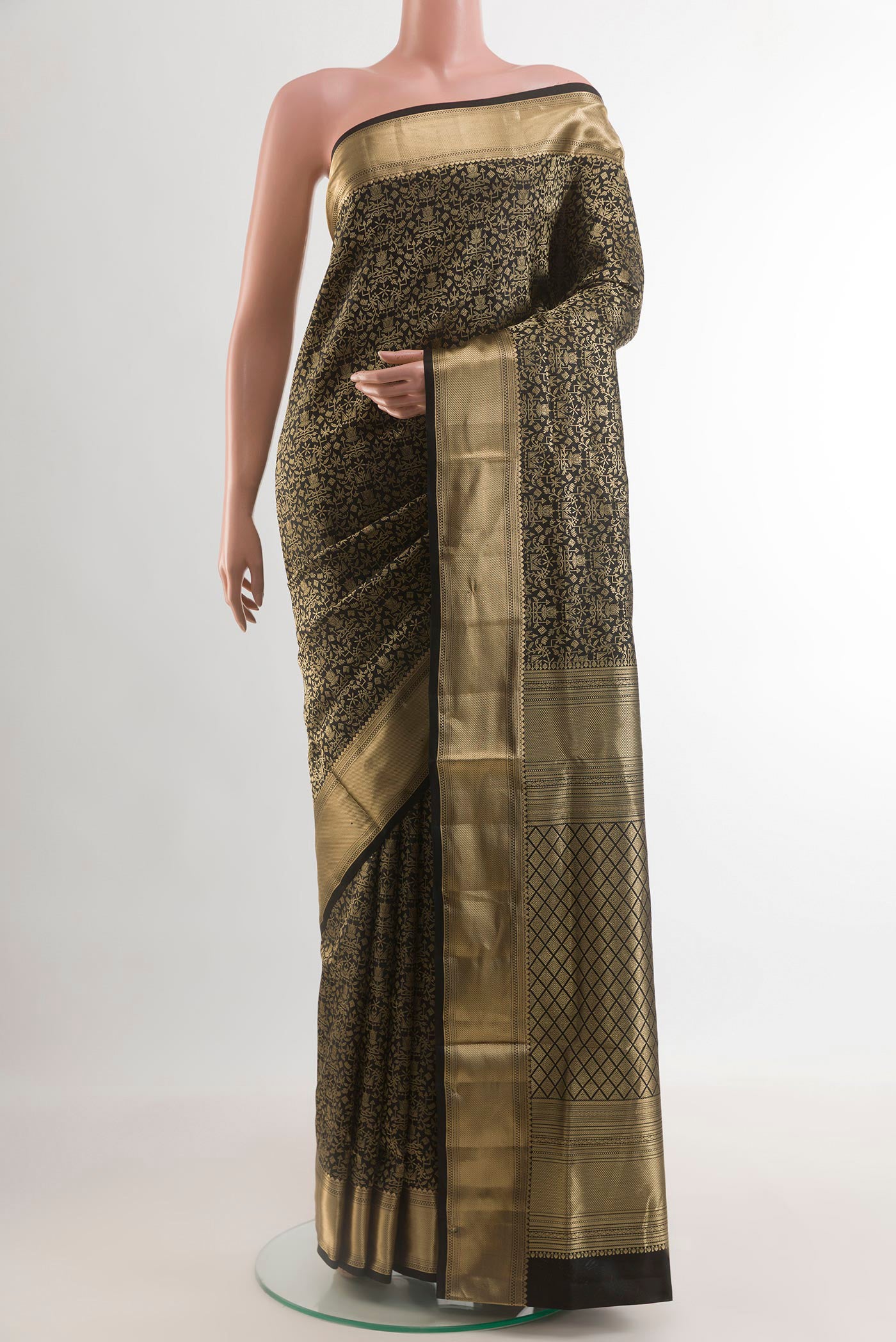 Black Soft Silk Saree with Zari Brocade on the body and Zari Border.  displayed on a mannequin