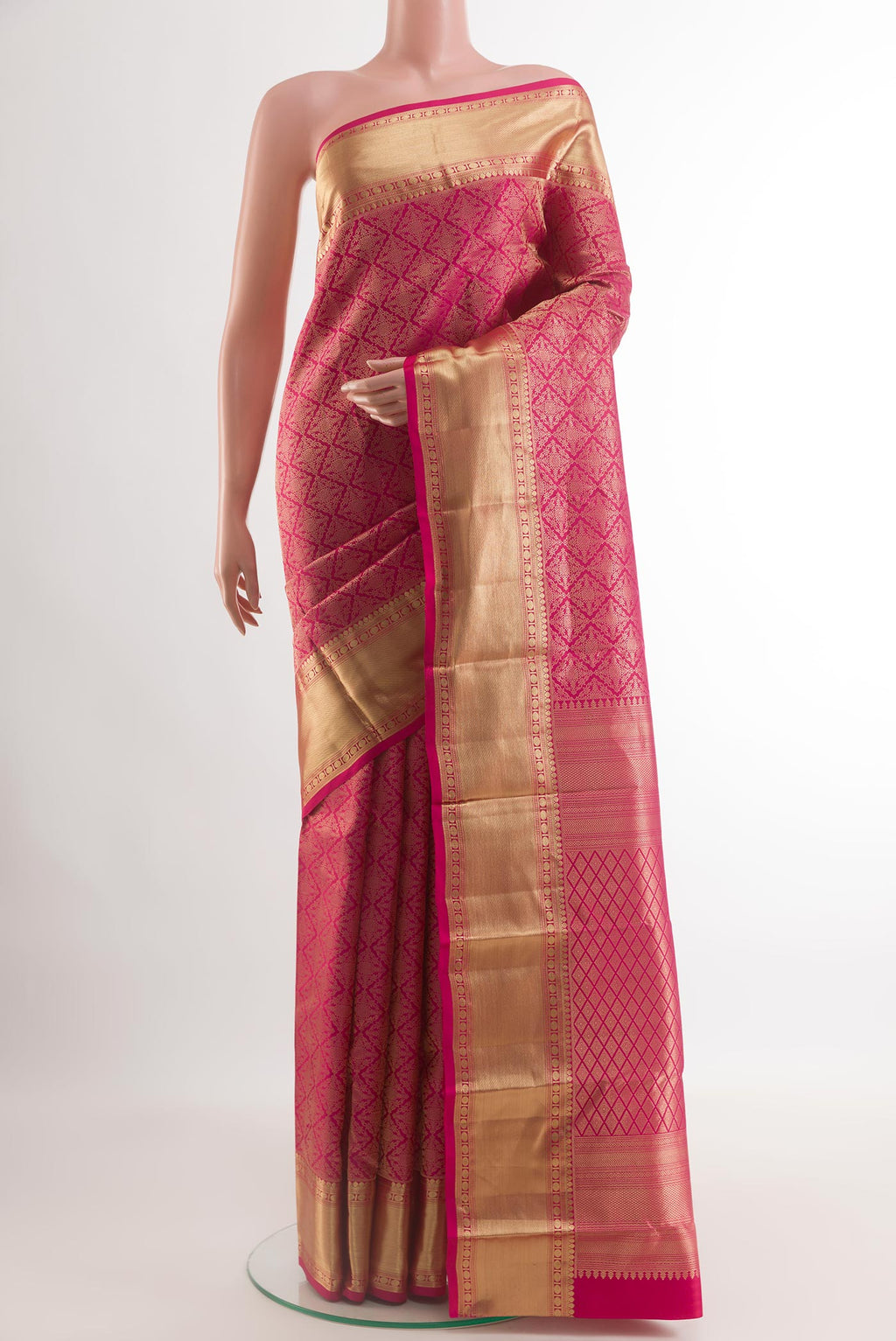 Pink Kanchipuram Silk Saree with Zari Brocade on the body and Zari Border.  displayed on a mannequin