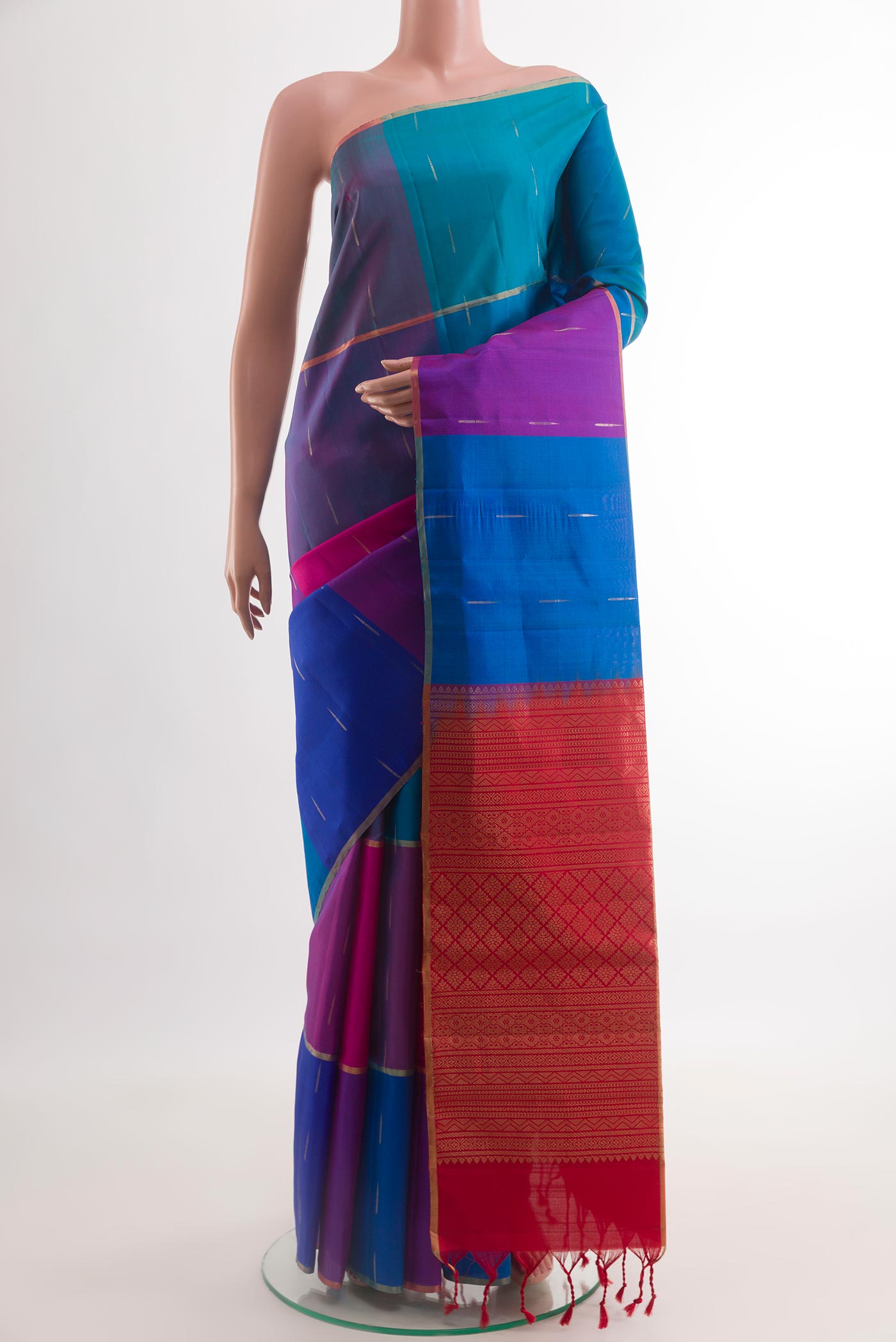 Multi Color Soft Silk Saree with Checked design on the body and Zari Border.  displayed on a mannequin