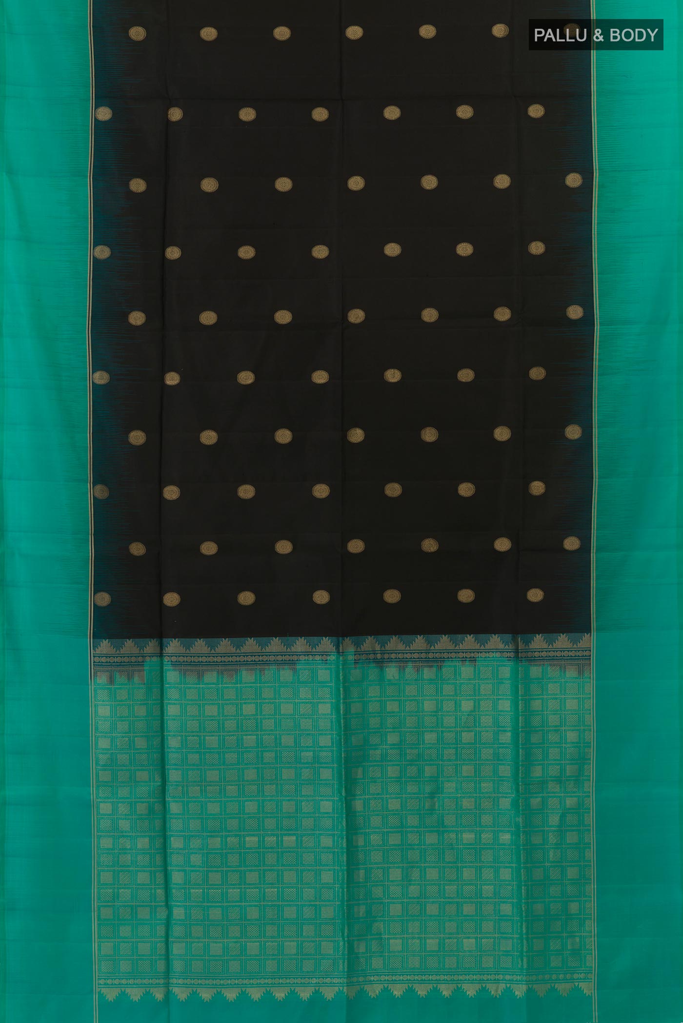 Flat view of Black Soft Silk Saree with Zari Butta on the body and Zari Border. 