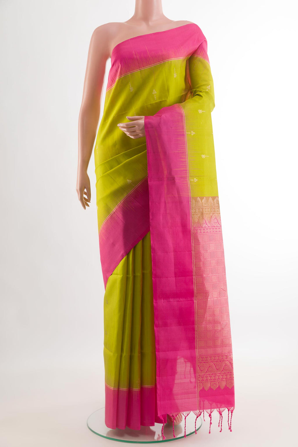 Lemon Yellow Soft Silk Saree with Zari Butta on the body and Zari Border.  displayed on a mannequin
