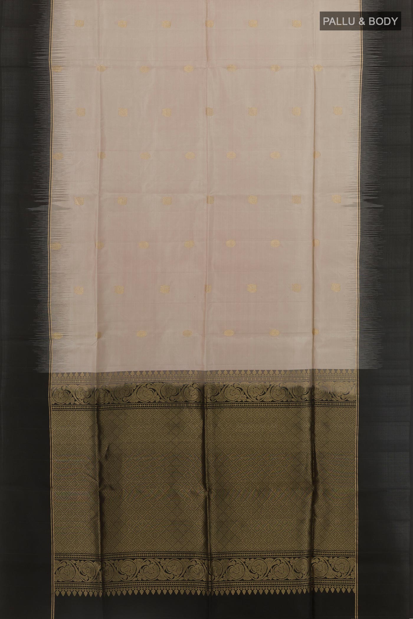 Flat view of Off White Soft Silk Saree with Zari Butta on the body and Zari Border. 