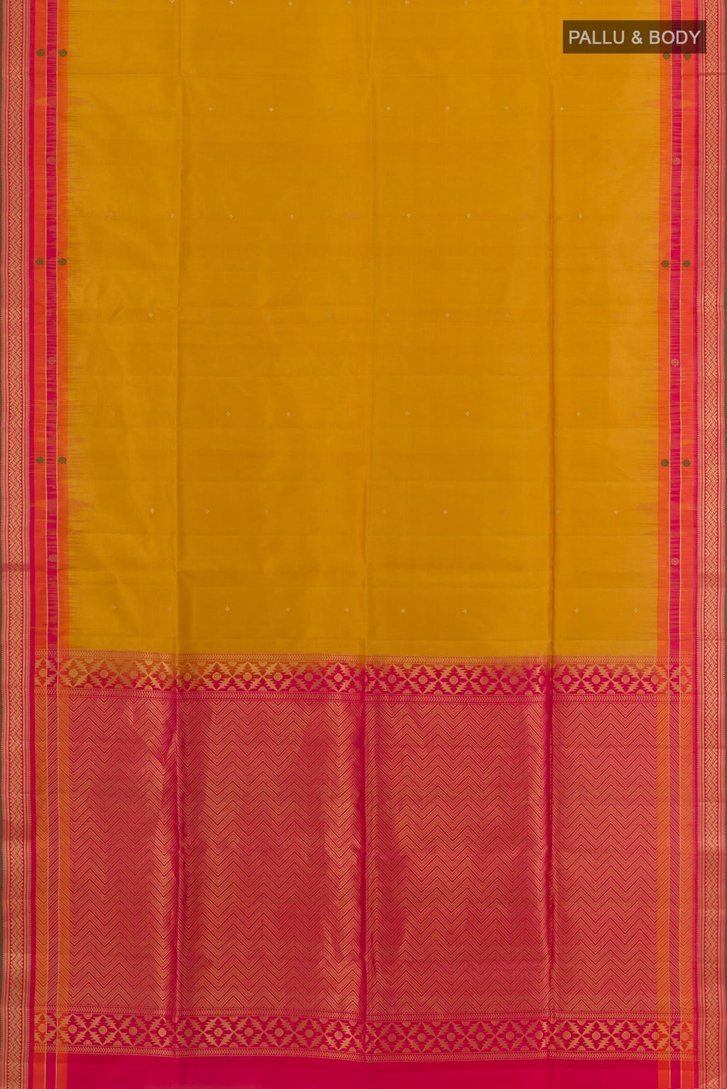 Flat view of Mustard Soft Silk Saree with Zari Butta on the body and Zari Border. 