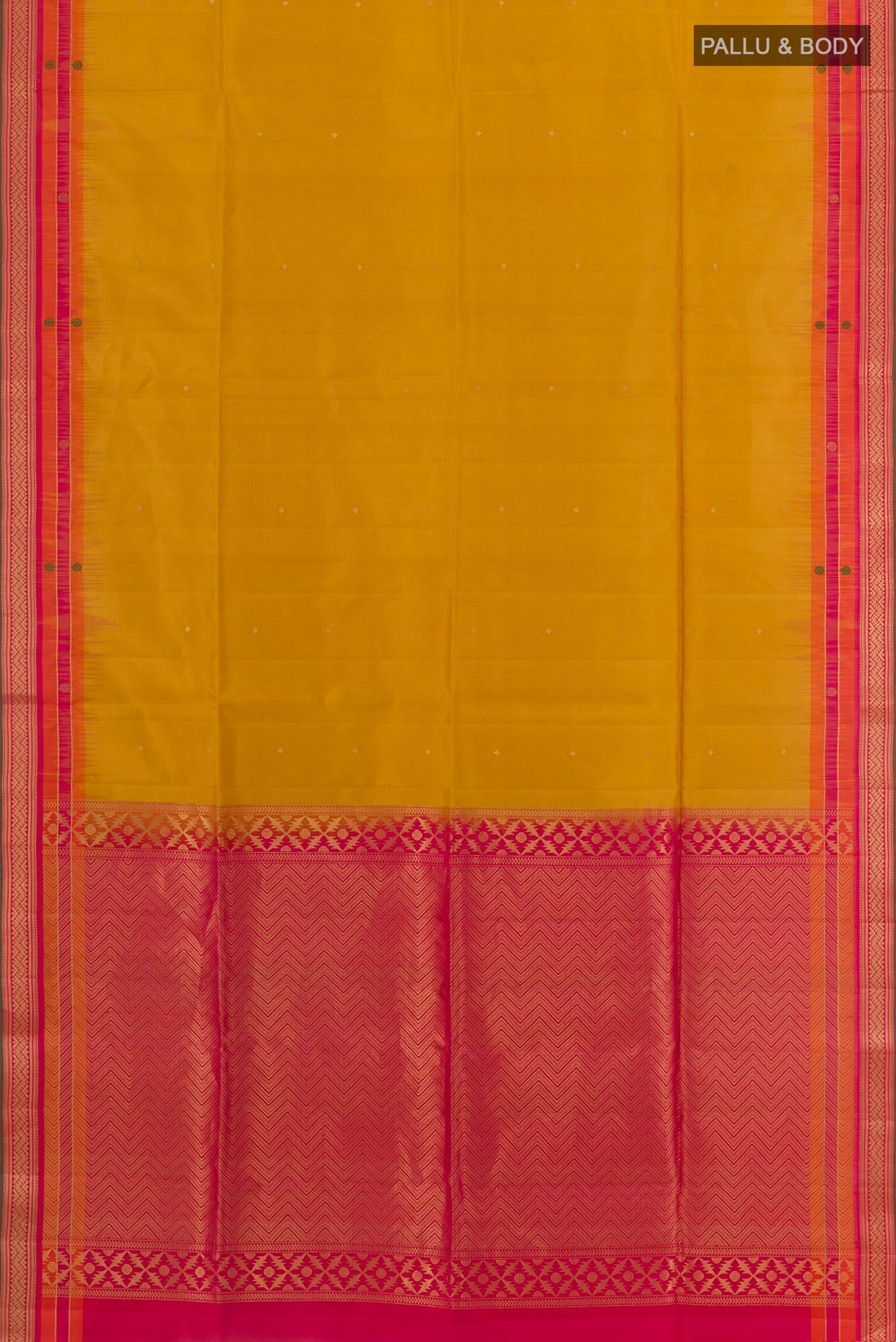 Flat view of Mustard Soft Silk Saree with Zari Butta on the body and Zari Border. 