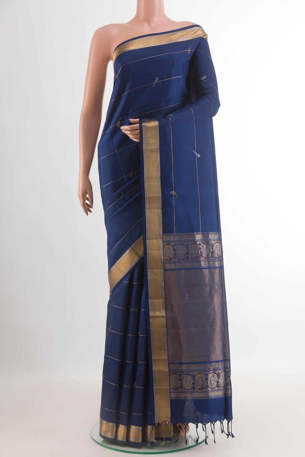 Blue Soft Silk Saree with Stripes on the body and Zari Border.  displayed on a mannequin