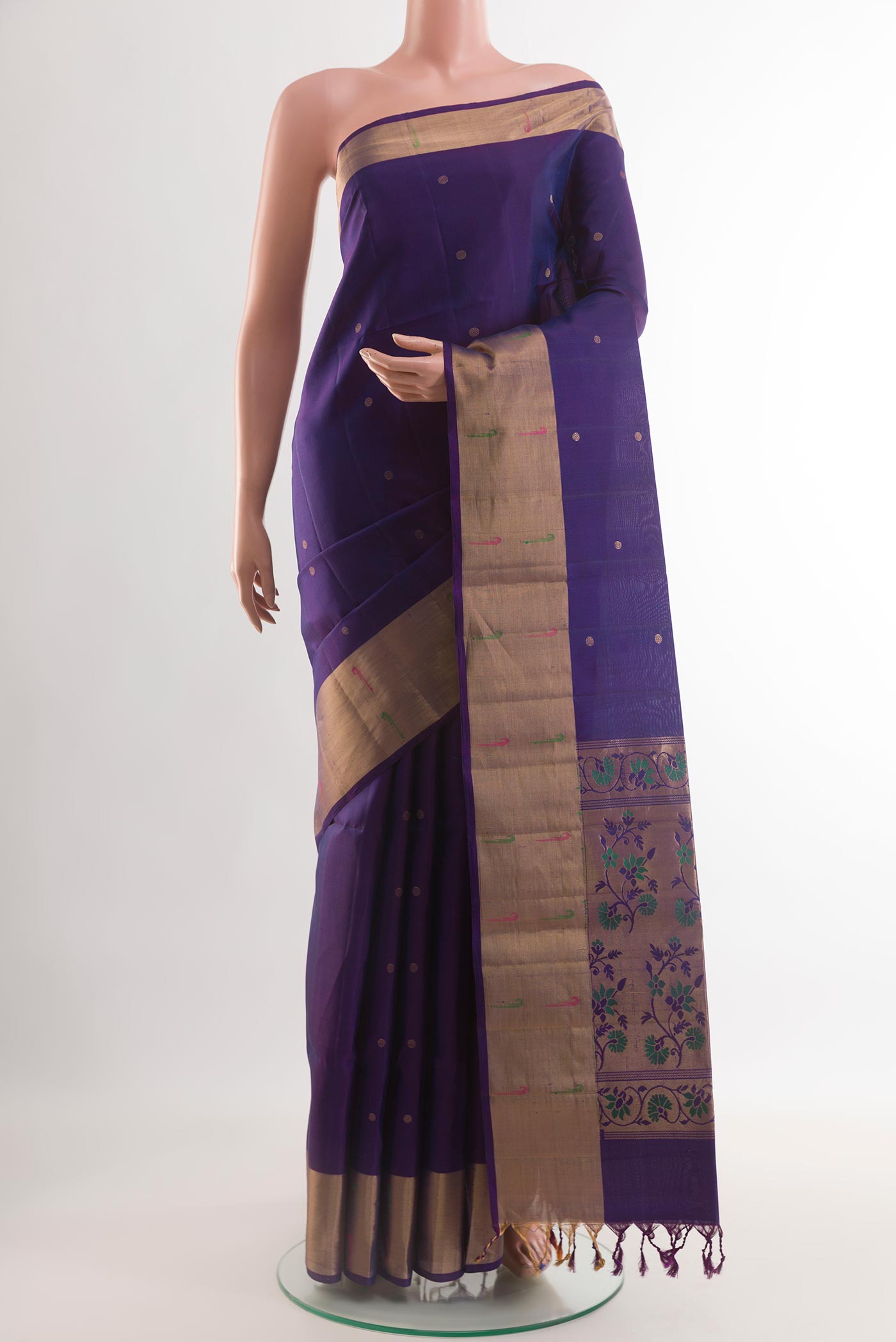 Dark Blue Soft Silk Saree with Zari Butta on the body and Zari Border.  displayed on a mannequin
