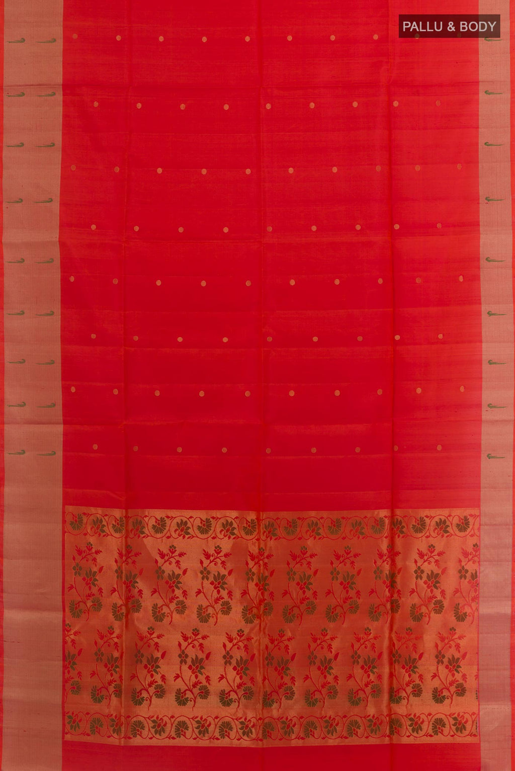 Flat view of Brick Orange Soft Silk Saree with Zari Butta on the body and Zari Border. 