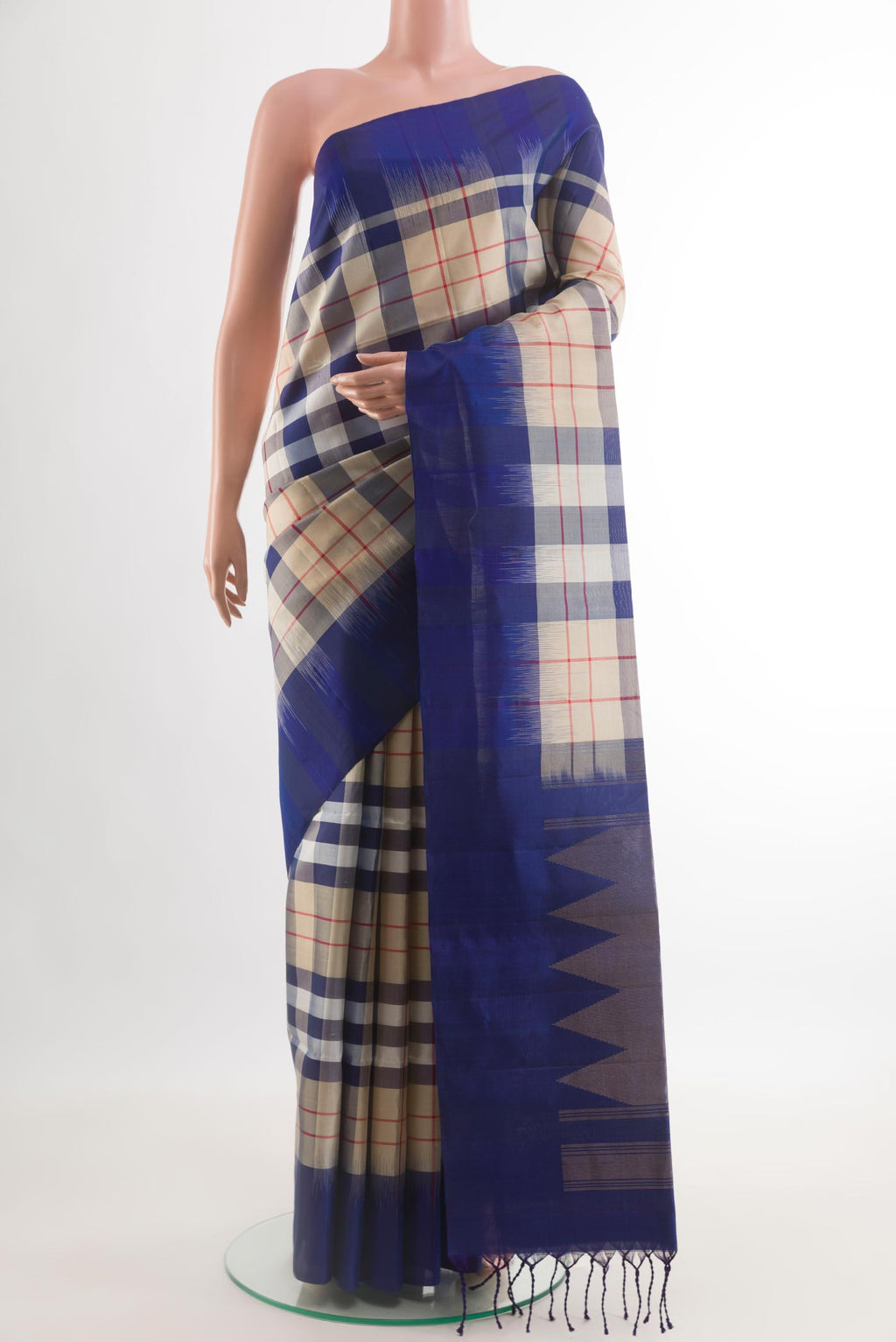 Off White Soft Silk Saree with Checked design on the body and Zari Border.  displayed on a mannequin