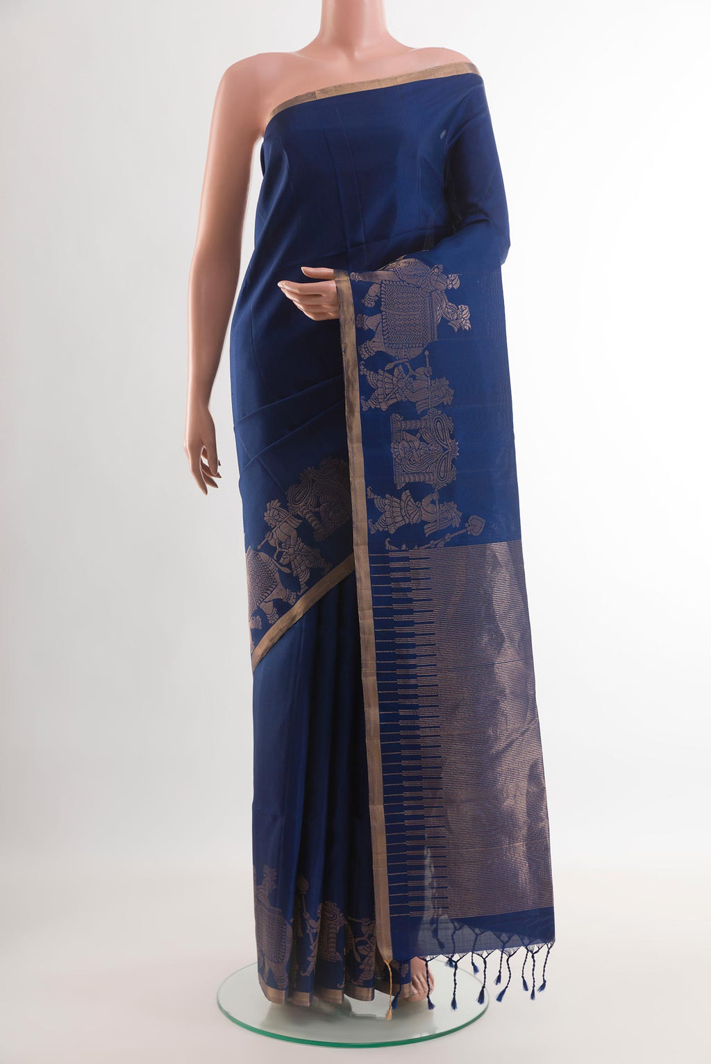Blue Soft Silk Saree with Plain Body and Fancy Border.  displayed on a mannequin