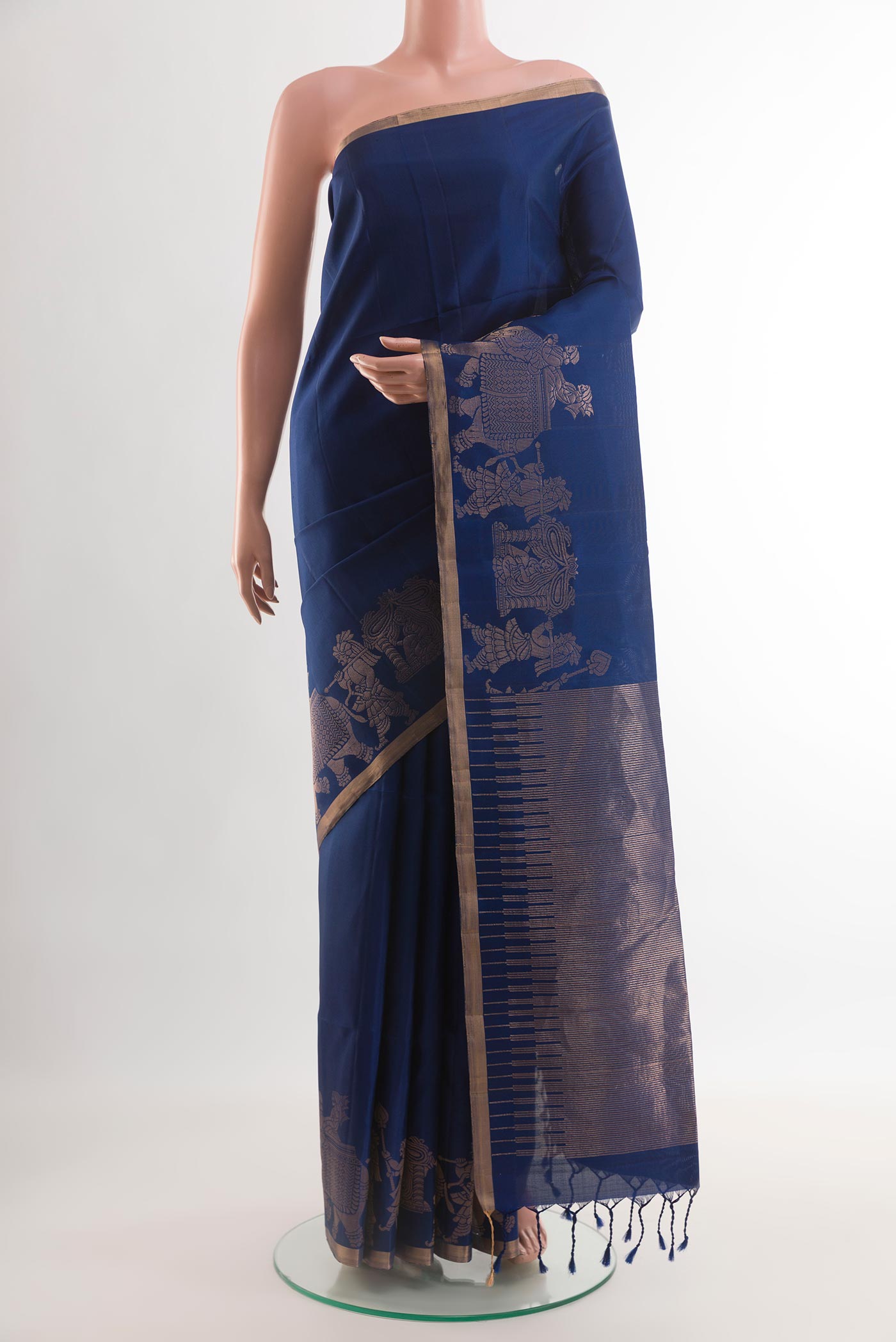 Blue Soft Silk Saree with Plain Body and Fancy Border.  displayed on a mannequin