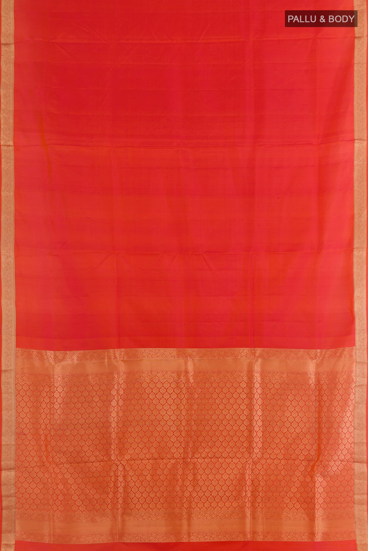 Flat view of Brick Orange Dual Tone Soft Silk Saree with Plain Body and Zari Border. 