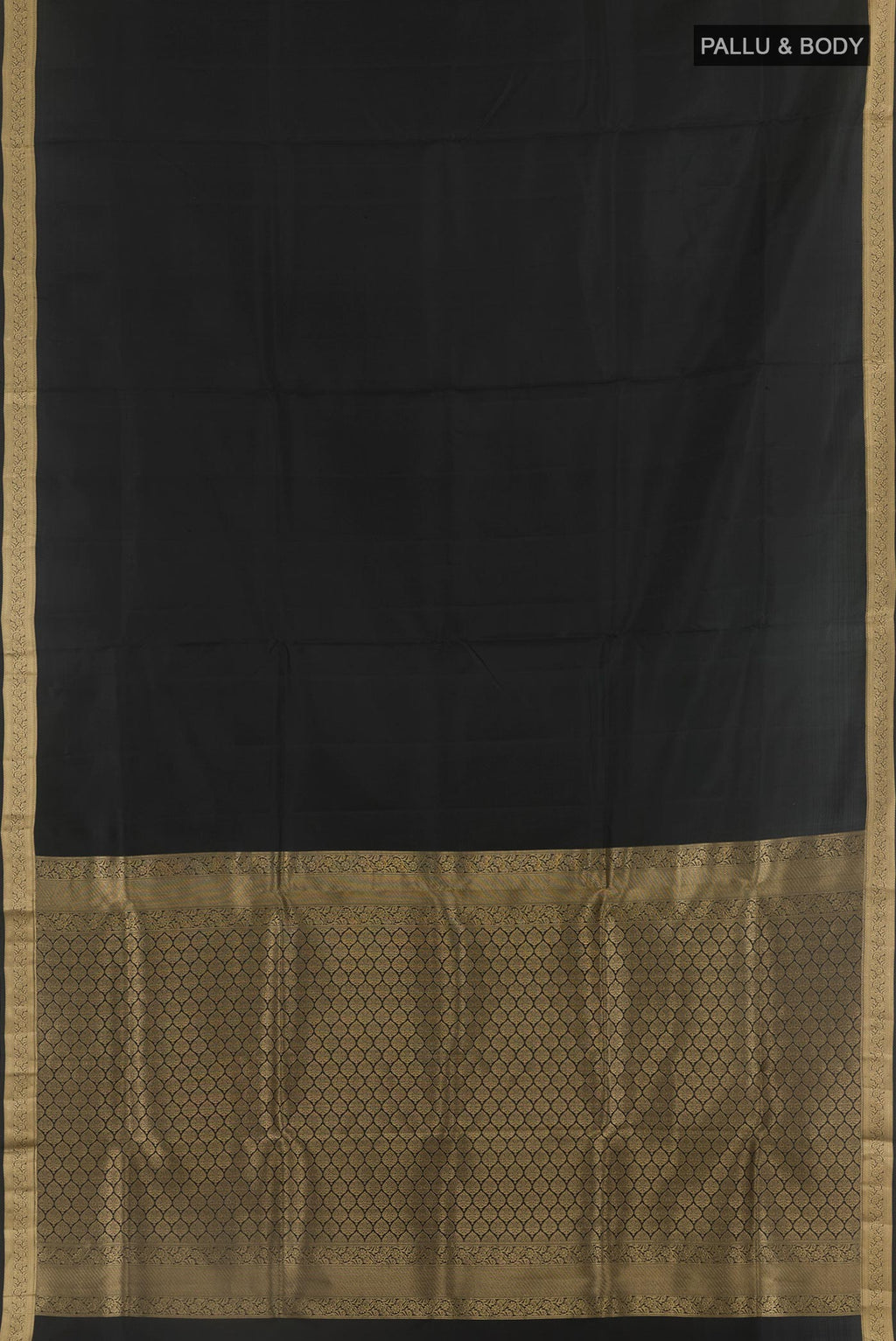 Flat view of Black Soft Silk Saree with Plain Body and Zari Border. 