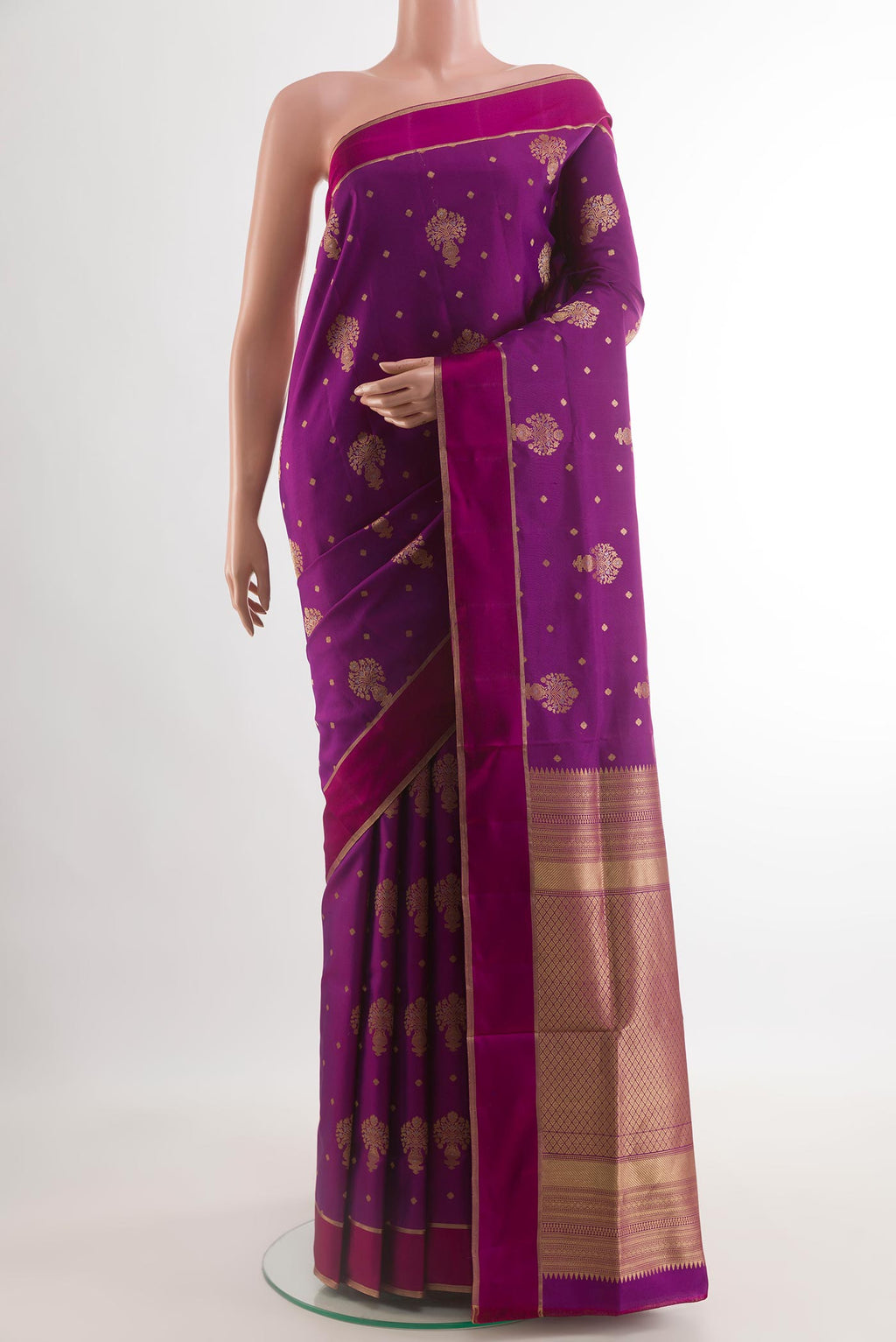 Purple Soft Silk Saree with Zari Butta on the body and Zari Border.  displayed on a mannequin