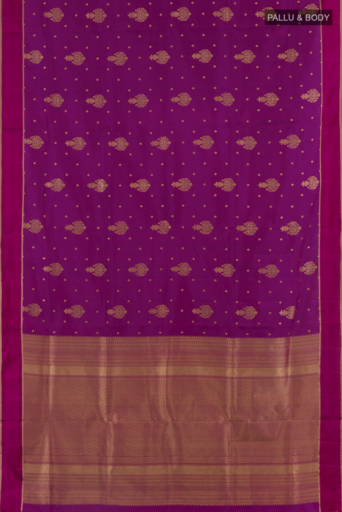 Flat view of Purple Soft Silk Saree with Zari Butta on the body and Zari Border. 