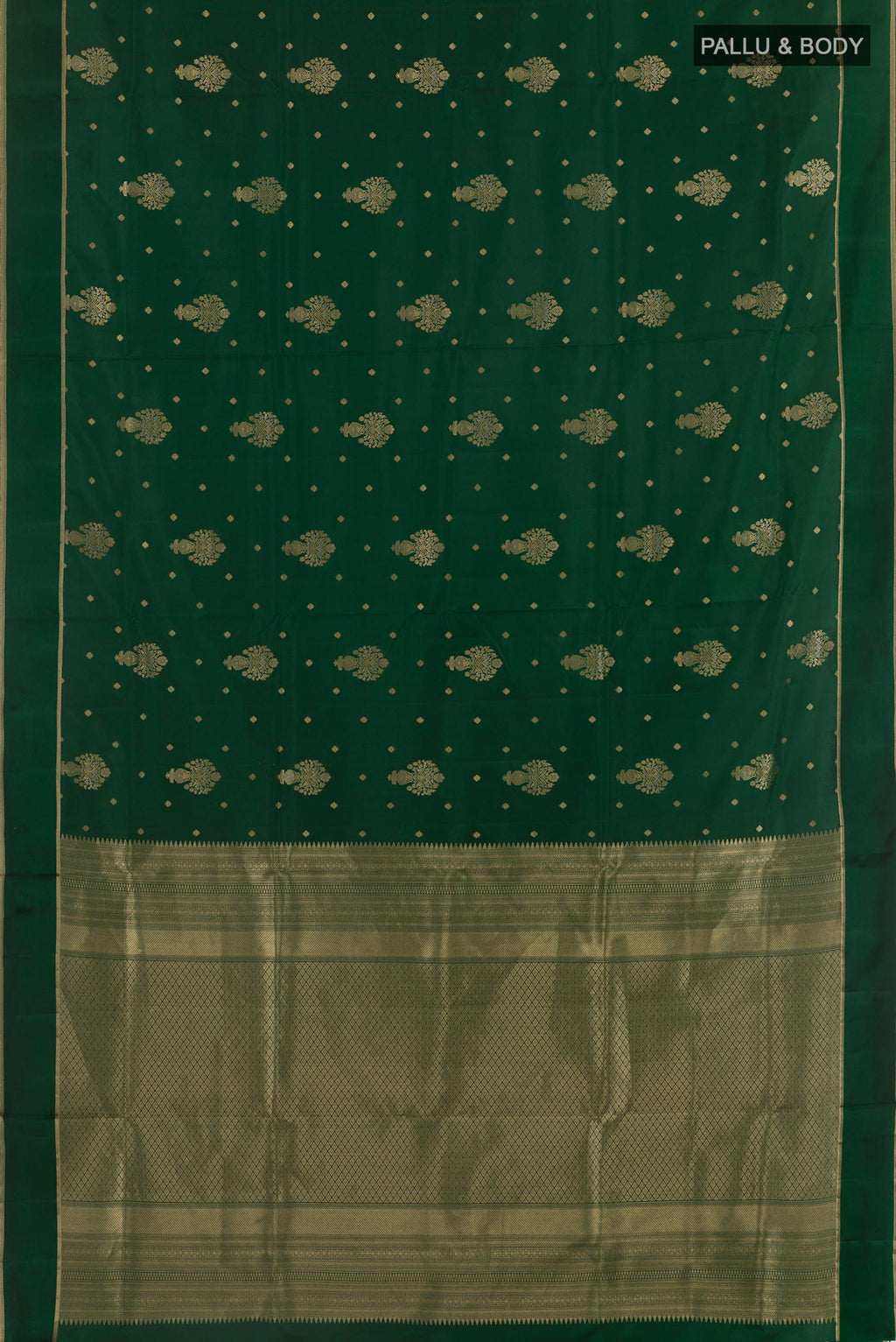 Flat view of Bottle Green Soft Silk Saree with Zari Butta on the body and Zari Border. 