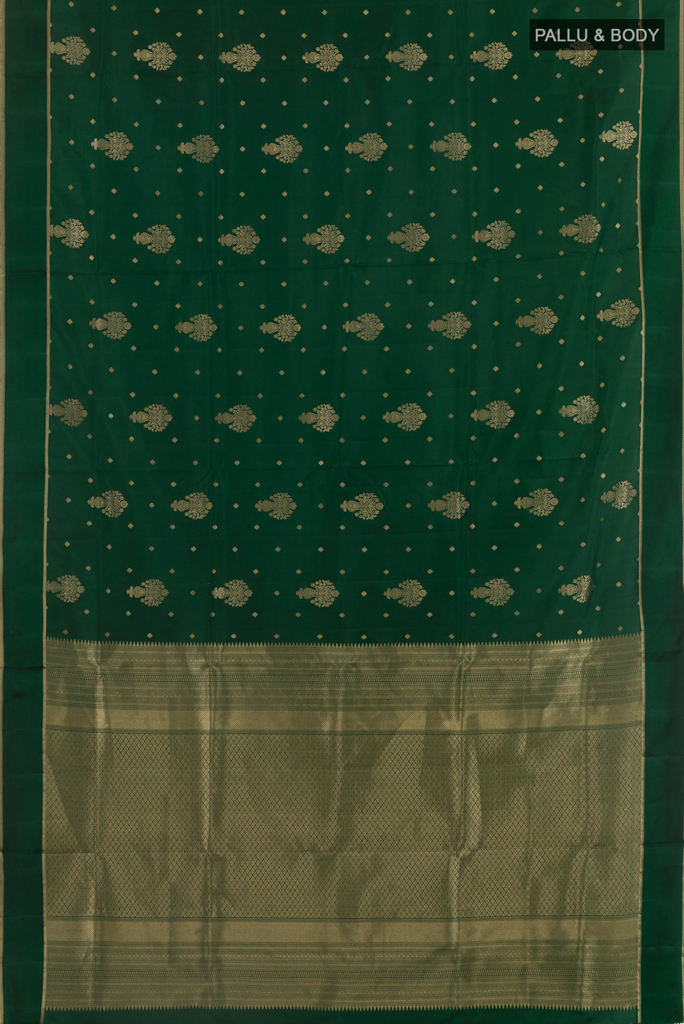 Flat view of Bottle Green Soft Silk Saree with Zari Butta on the body and Zari Border. 