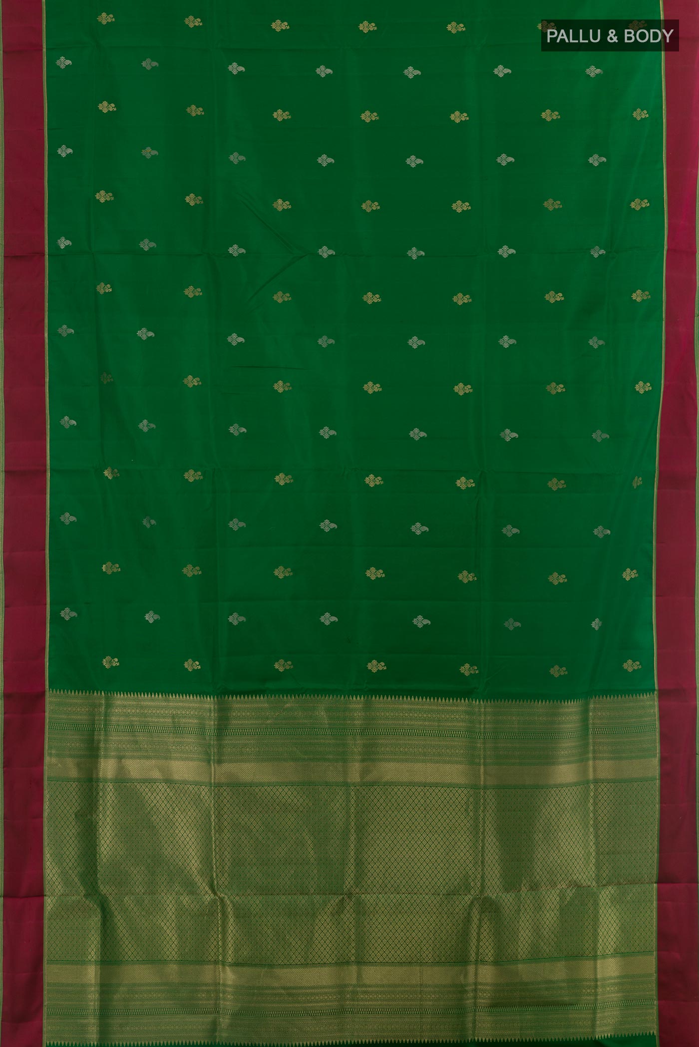 Flat view of Green Soft Silk Saree with Zari Butta on the body and Thread Border. 